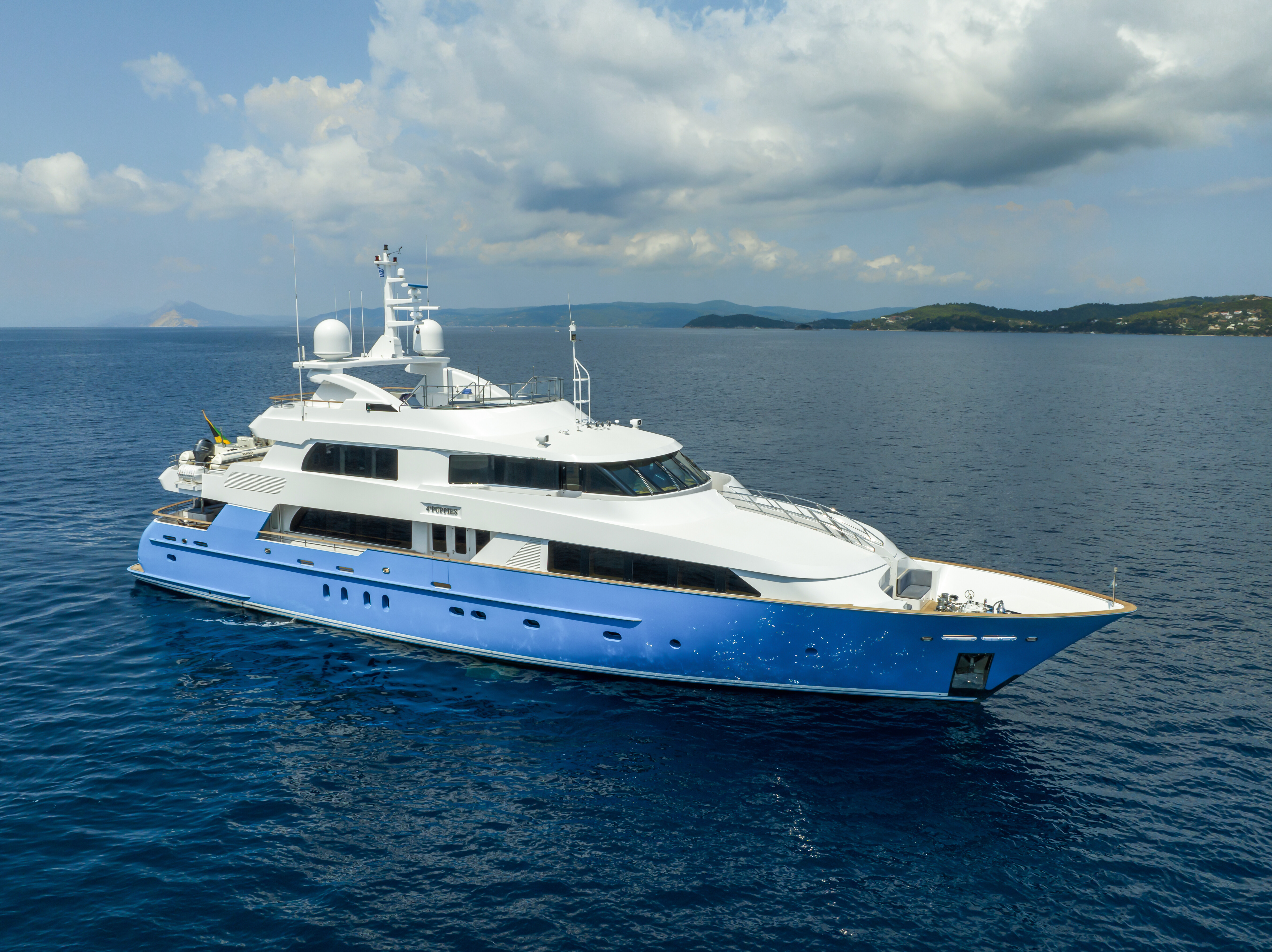 Aboard 4*PUPPIES a 130ft (39.62m) luxury motor yacht for Sale available with Fraser Yachts, built by PALMER JOHNSON in 2003
