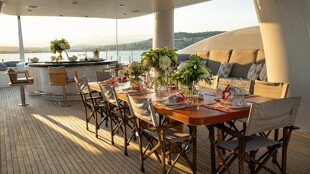 https://media.fraseryachts.com/Yachts/Y2326_MC_MC/images/yachtfolio/54-30-upper-deck-dining-table_178925-ibNj3UB2.jpg?vh=63297b&w=310