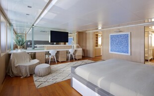 https://media.fraseryachts.com/Yachts/Y457_MC_MC/images/yachtfolio/vicky-owner-s-suite-with-large-vanity-for-charters-the-linen-covering-will-be-removed-to-show-the-white-leather-cushions-underneath_102538-rxeRkumg.jpg?vh=fd0d29&w=310
