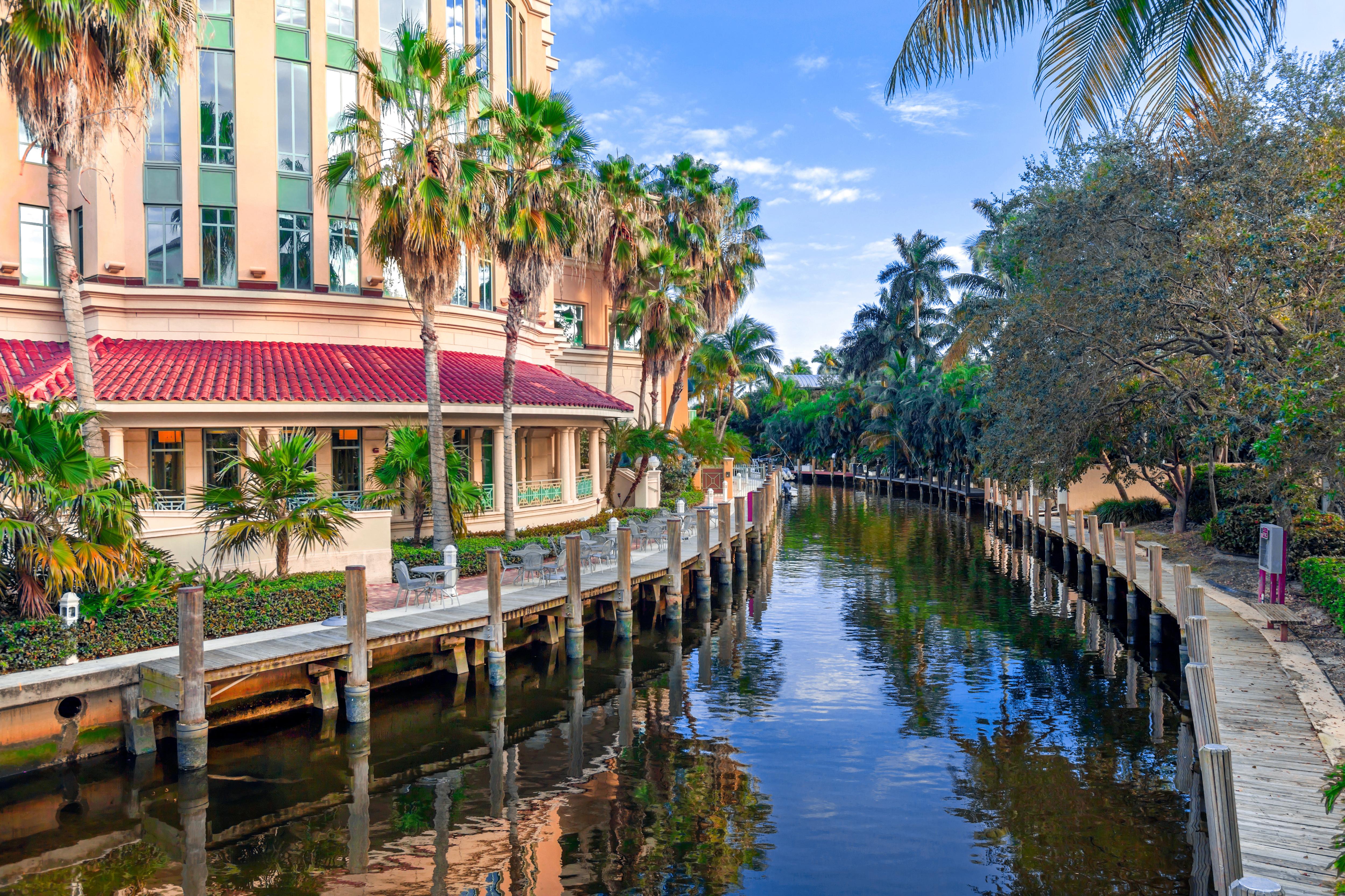 Himmarshee Canal at Las Olas Boulevard, Fort Lauderdale—historic waterway lined with palm trees, boutiques, and marina access in Florida’s yacht capital | Fraser Yachts