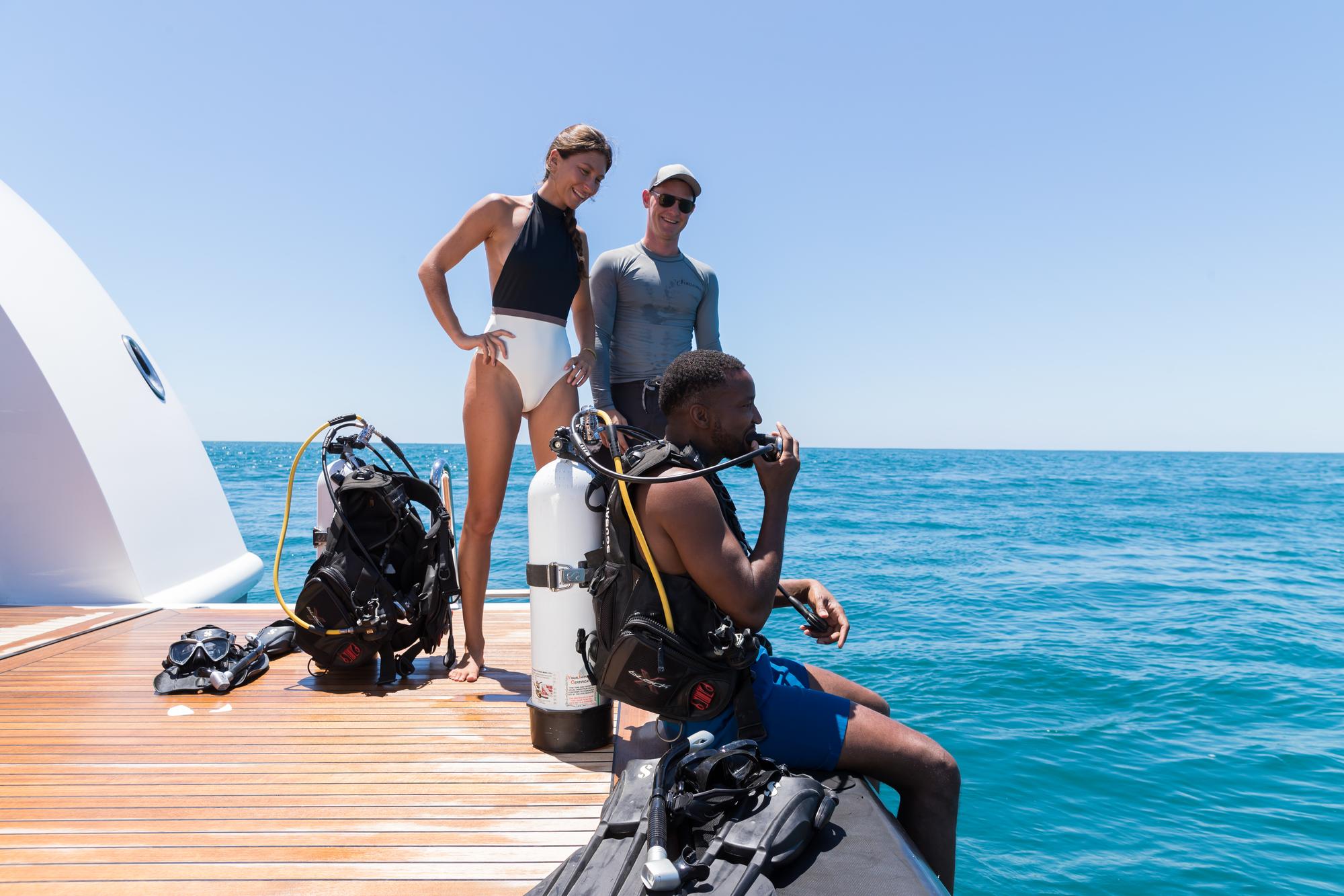 A captivating diving session near the Formosa yacht in Costa Rica, featuring divers exploring the rich marine life and vibrant underwater scenery. | Formosa yacht, lifestyle diving, Costa Rica, diving session | Fraser Yachts