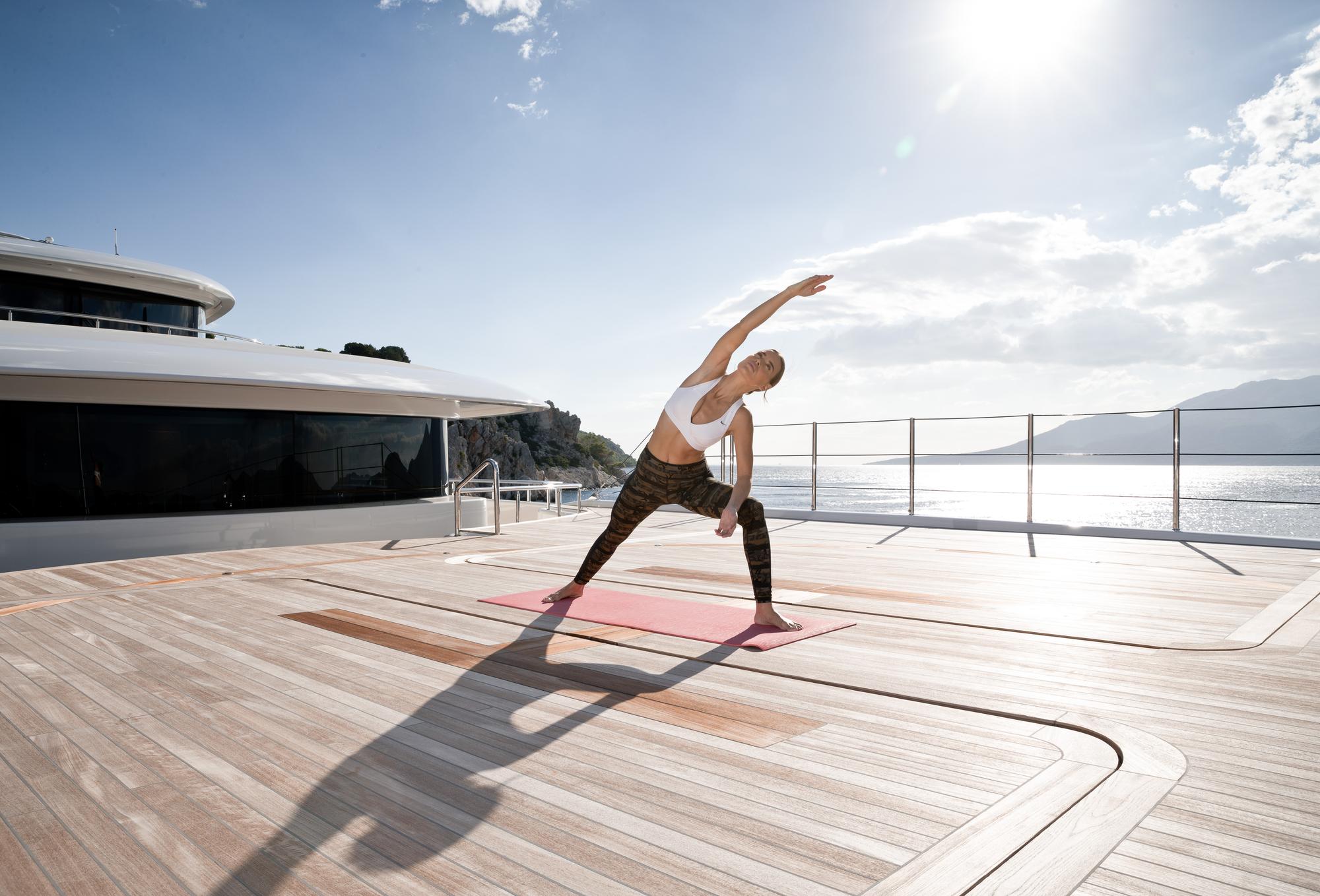 optasia-lifestyle-fitness-yoga-deck_fraseryachts-fYACmMIf.jpg