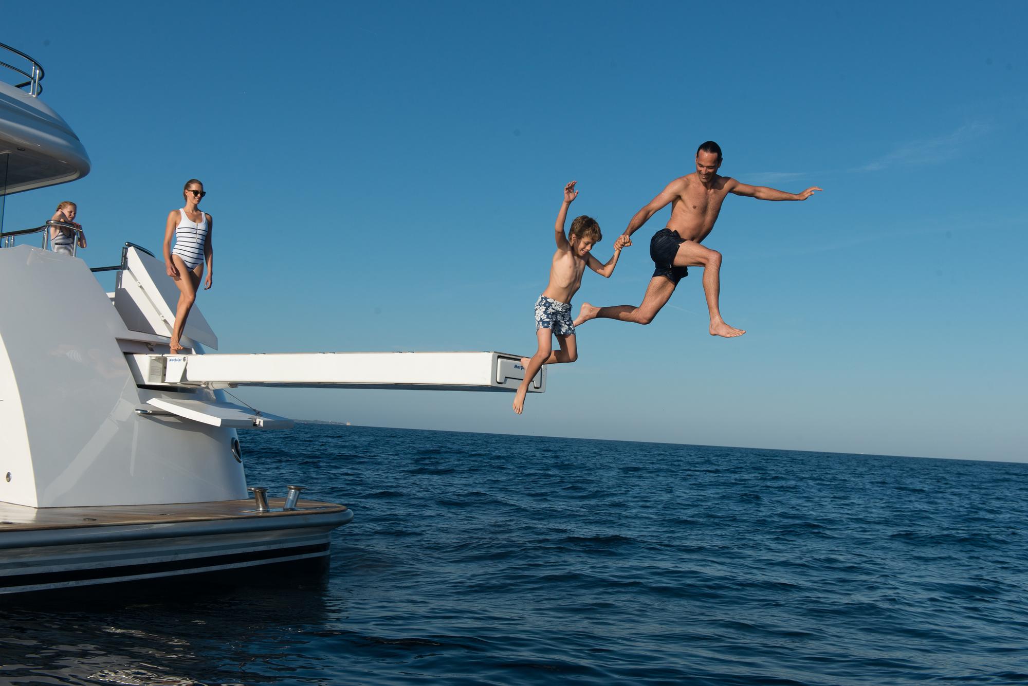 liberty-lifestyle-family-swimming-jumping_fraseryachts-dX8z2xBK.jpg