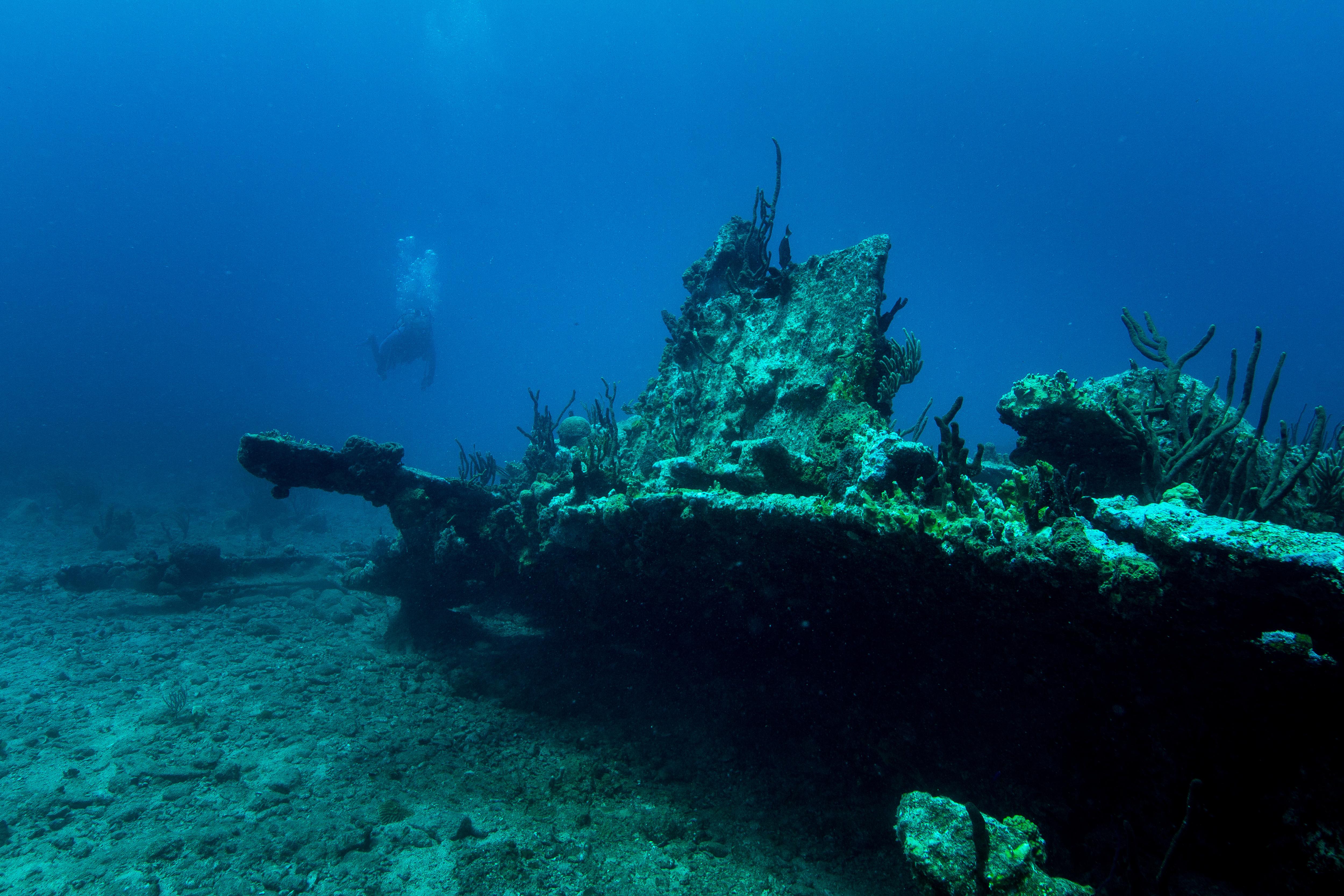 Wreck Alley dive site near Virgin Gorda, BVI—an iconic underwater destination in the Caribbean for scuba diving among sunken wrecks, coral-covered hulls, and marine life | Fraser Yachts