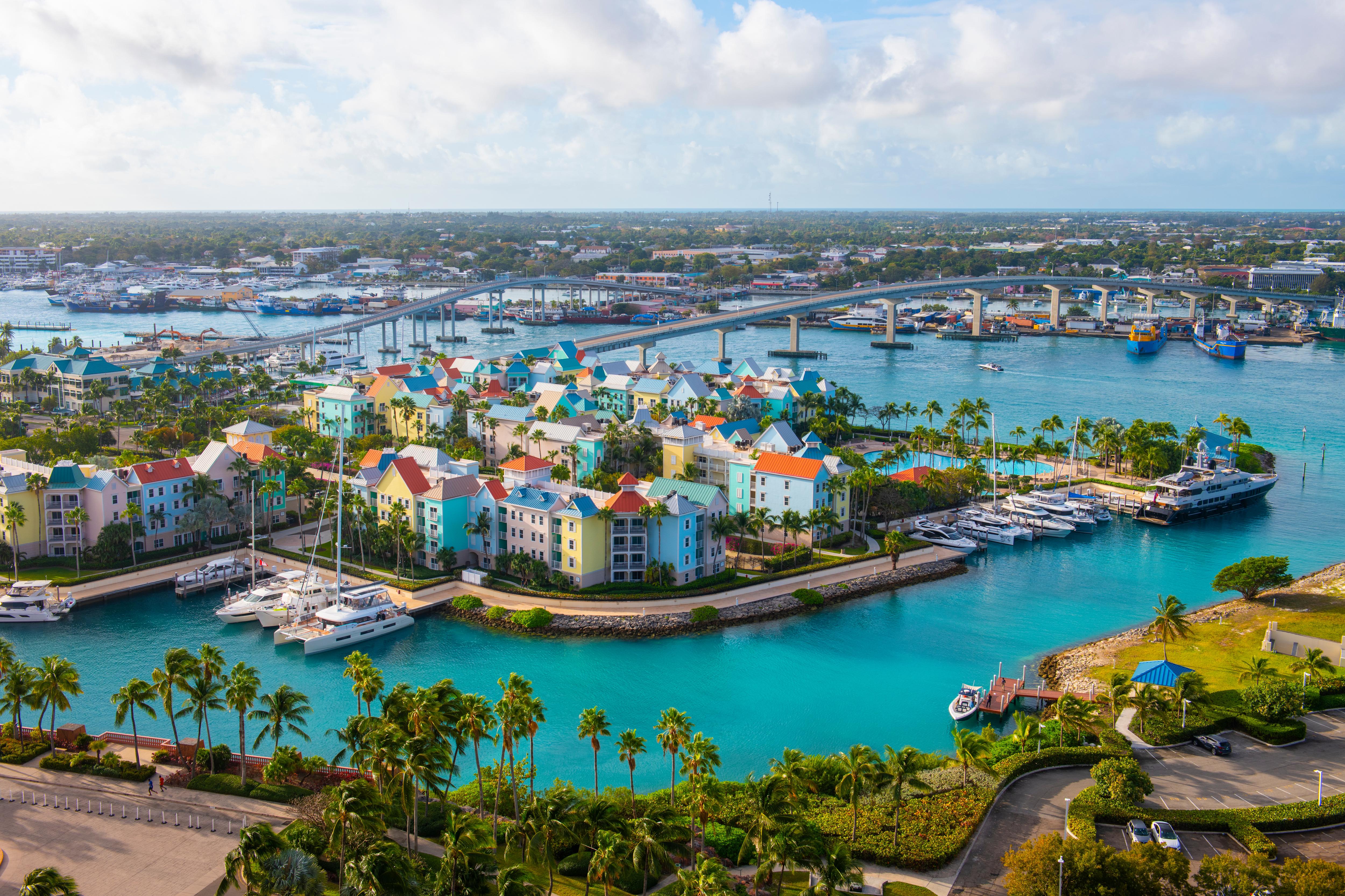 Aerial view of Harborside Villas at Nassau Harbour, Bahamas—luxury waterfront stays with downtown Nassau and Paradise Island just steps from premier yacht marinas | Fraser Yachts