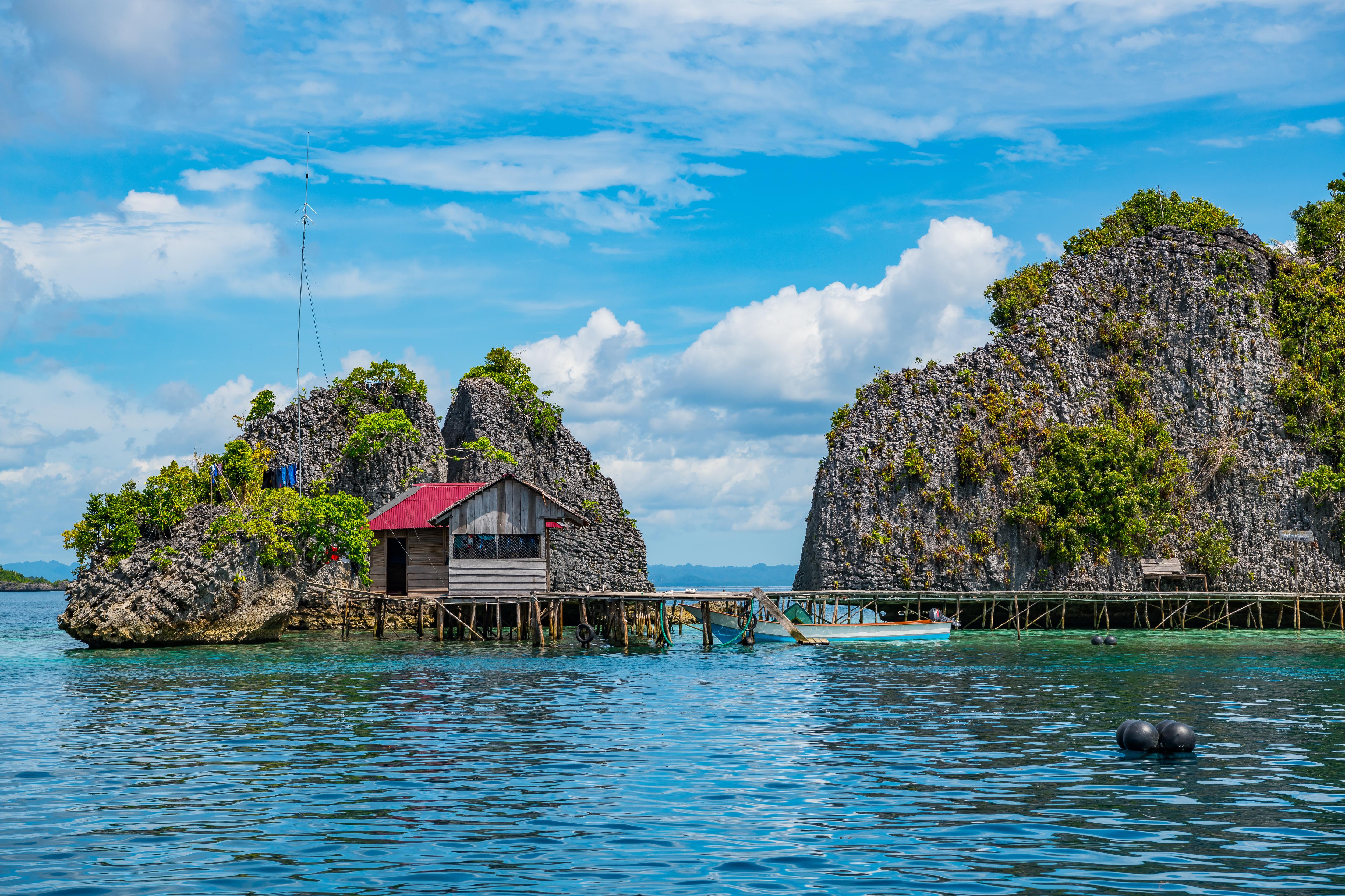 Explore East Misool in Raja Ampat, Indonesia, where emerald islets rise from shallow turquoise lagoons—perfect for kayaking, snorkeling, and secluded island adventures | Fraser