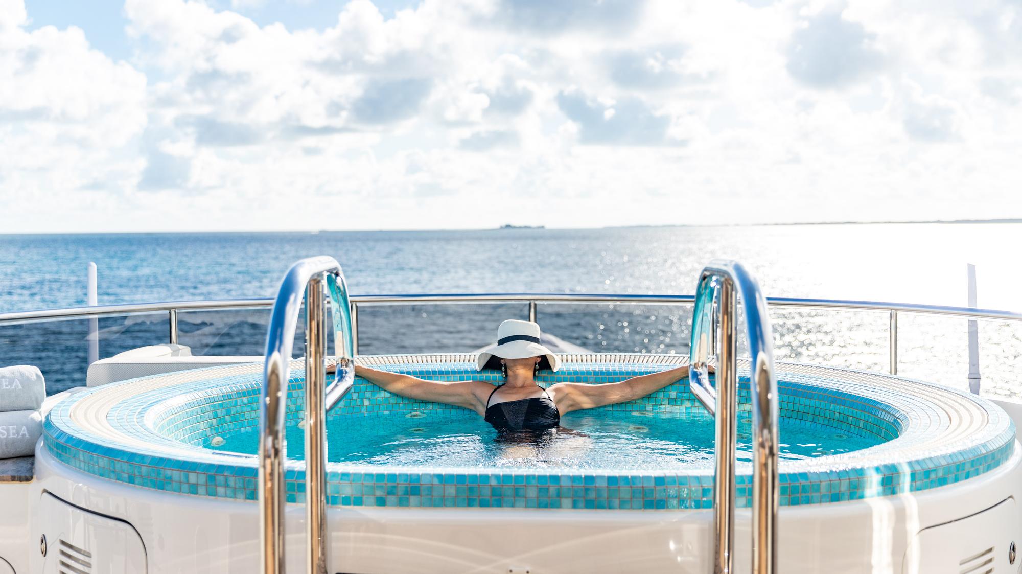 odyssea-lifestyle-hot-tub-woman-hat_fraseryachts-U7L4nQi1.jpg