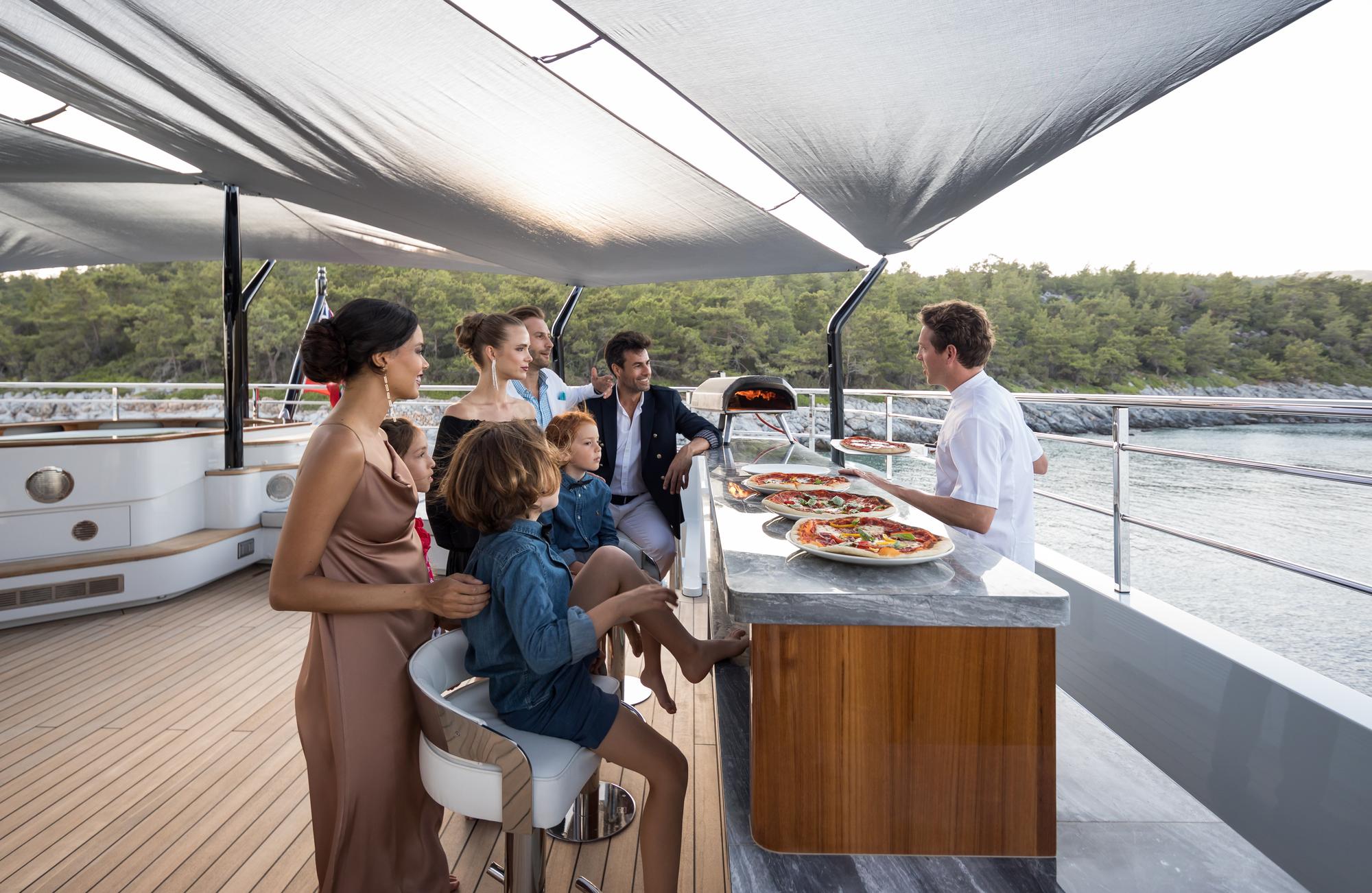 victorious-lifestyle-onboard-pizza-family_fraseryachts-evUY8VEx.jpg