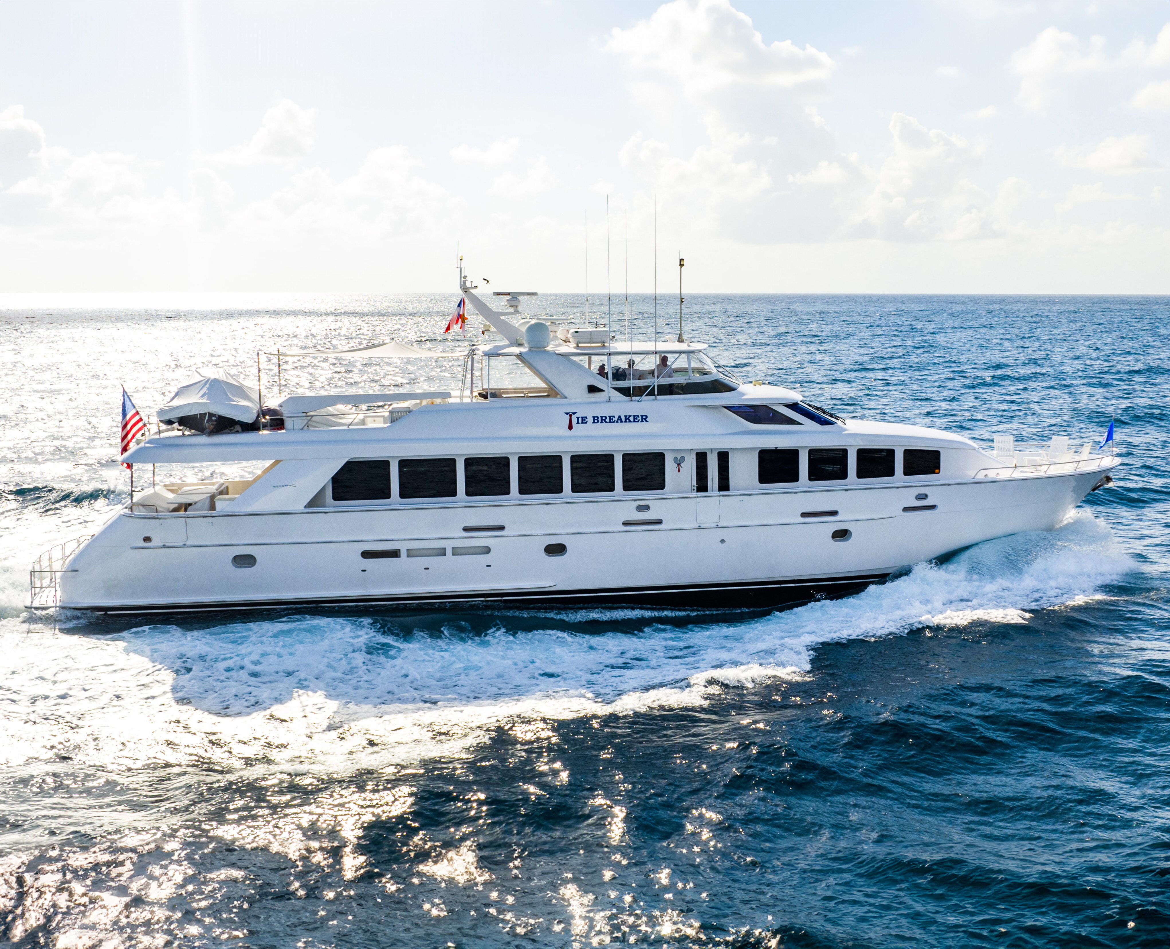 The exceptional TIE BREAKER yacht at Hatteras Shipyard, showcasing a robust design and luxurious accommodations. | TIE BREAKER yacht, Hatteras Shipyard, luxury yacht, yacht design, shipbuilding, robust design | Fraser Yachts