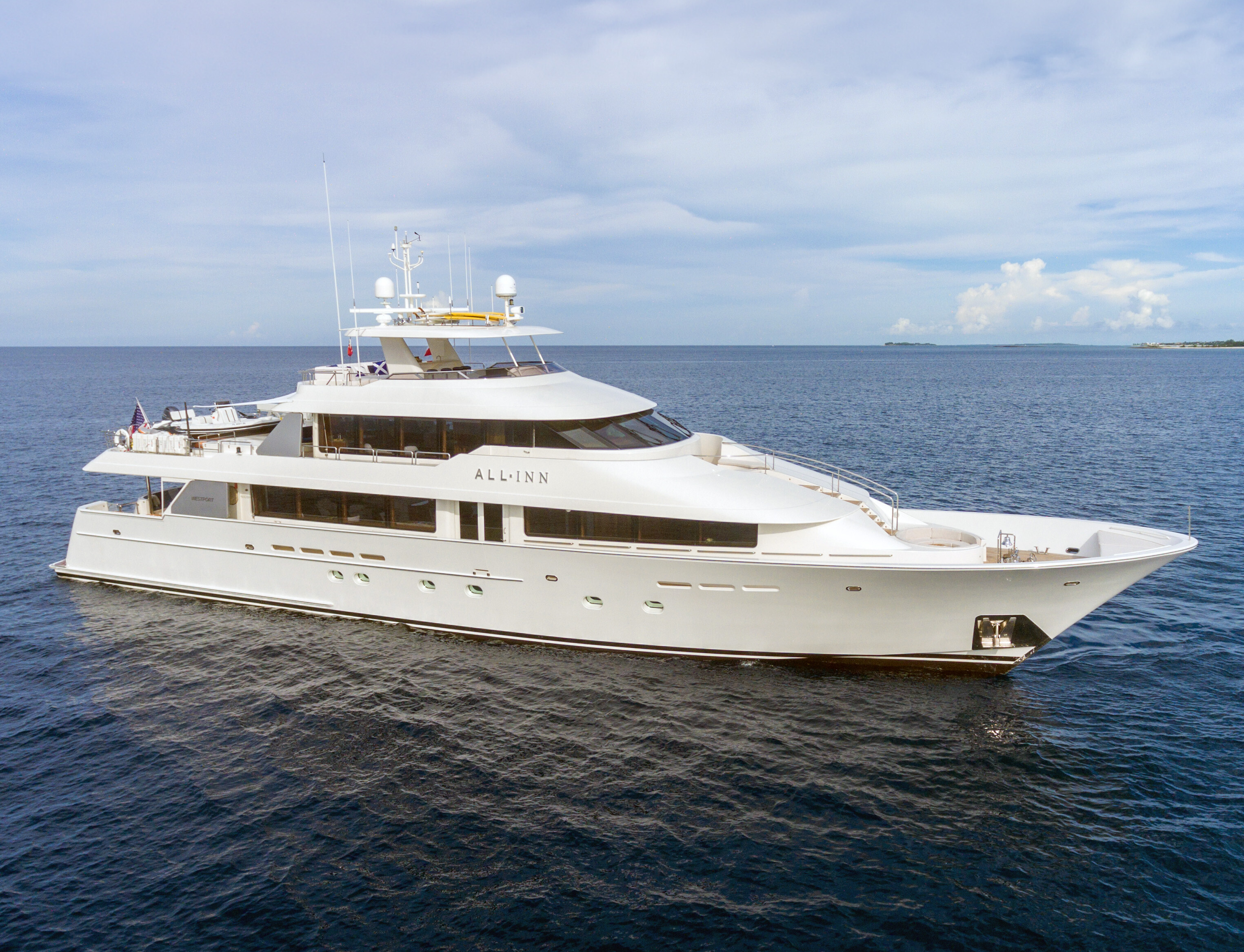 The luxurious ALL INN yacht at Westport Shipyard, showcasing a sleek design and top-tier amenities. | ALL INN yacht, Westport Shipyard, luxury yacht, yacht design, shipbuilding, sleek design | Fraser Yachts