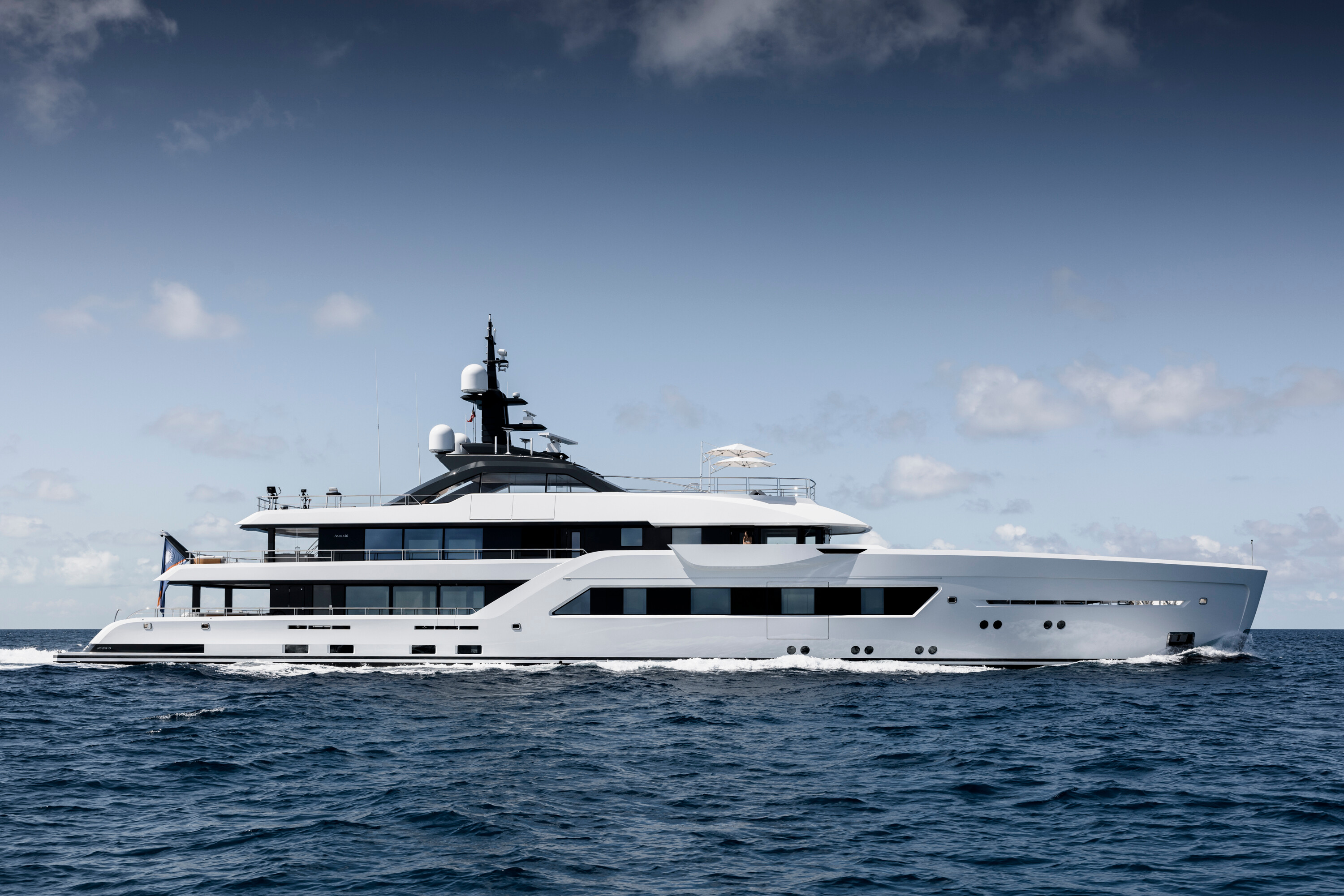 The exquisite Entourage yacht at Amels Shipyard, featuring innovative design and luxurious amenities for an unparalleled cruising experience. | Entourage yacht, Amels Shipyard, luxury yacht, yacht design, innovative design, onboard amenities | Fraser Yachts