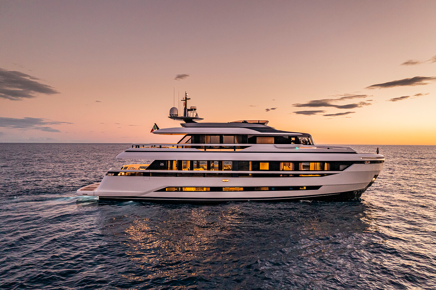 The EXTRA Shipyard's Triplex yacht showcasing its innovative multi-level design and spacious exterior. | EXTRA Shipyard, Triplex yacht, multi-level design, luxury yacht, innovative | Fraser Yachts