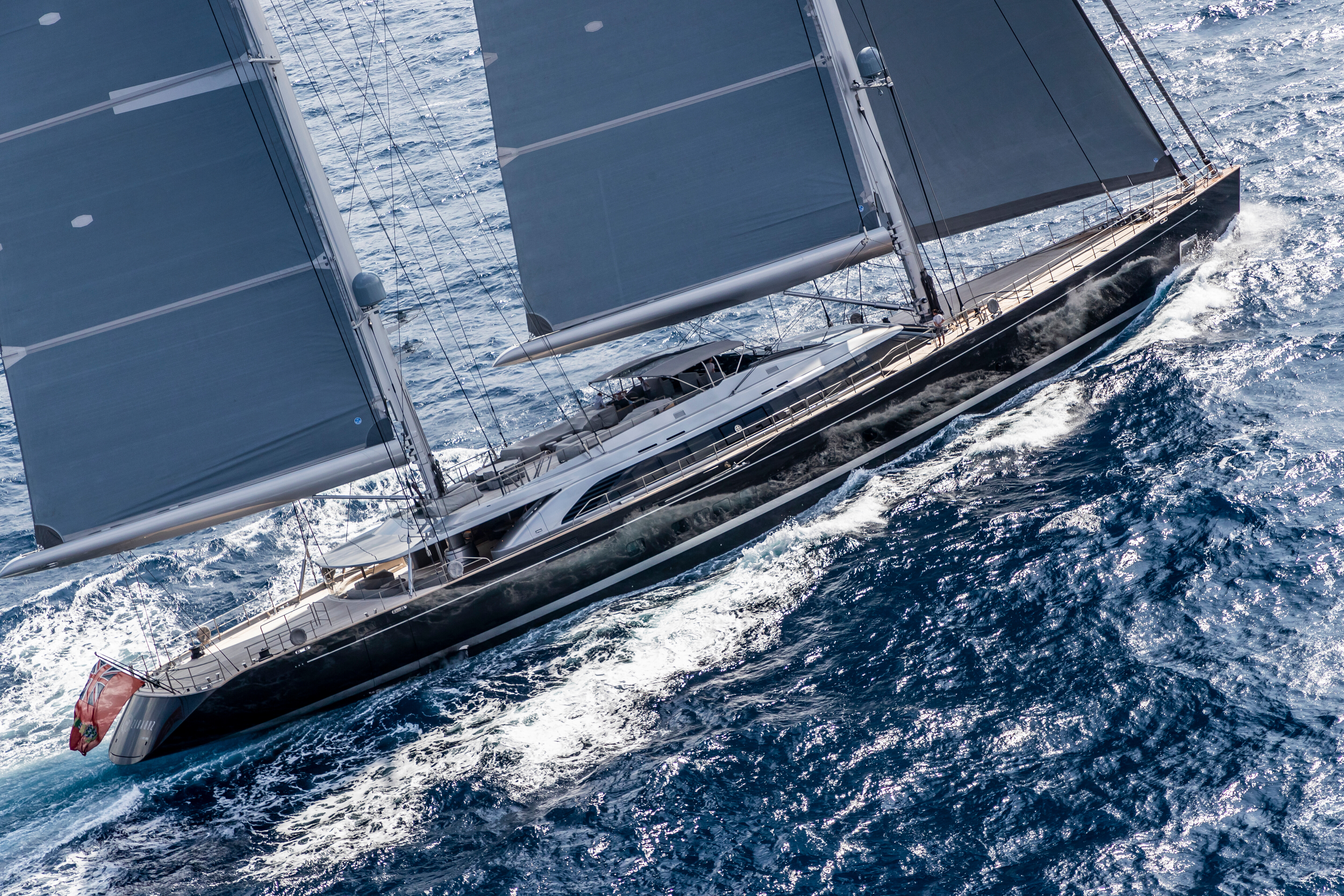 The luxury yacht BADIS, formerly known as Sybaris, built by Perini Navi Shipyard, features a sleek design and exceptional sailing capabilities. | luxury yacht, Perini Navi Shipyard, BADIS, Sybaris, sleek design, exceptional sailing capabilities | Fraser Yachts