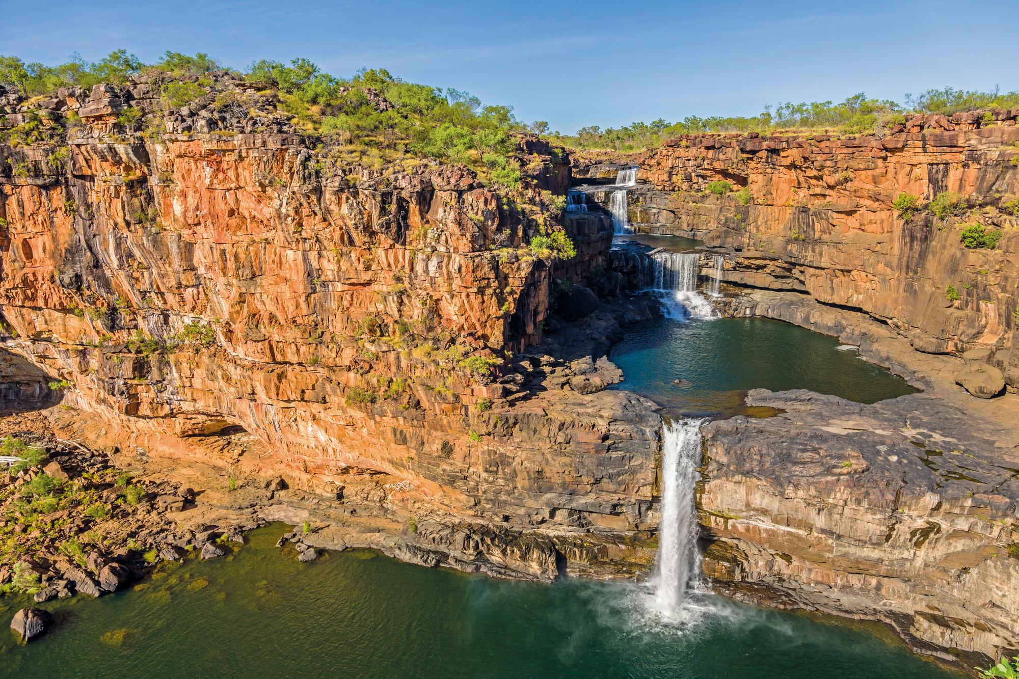 Embark on an adventure to the majestic Mitchell Falls along the Kimberley Coast in Australia with Fraser Yachts. | Australasia, Australia, Mitchell Falls, Kimberley Coast, yacht charter | Fraser