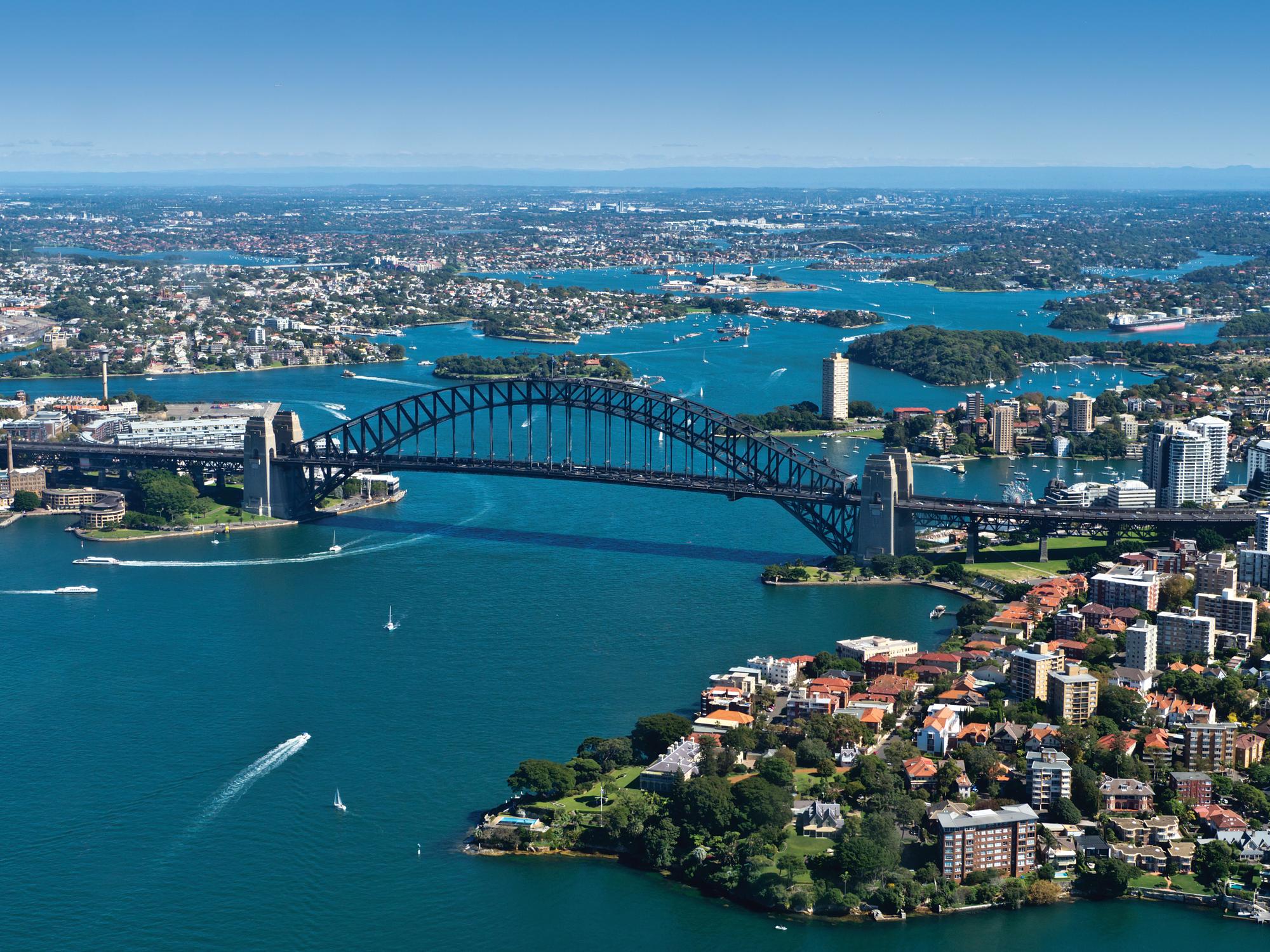 Experience the mesmerizing aerial view of Sydney's cityscape in Australia with Fraser Yachts. | Australasia, Australia, Sydney, landscape, city, aerial view, yacht charter | Fraser