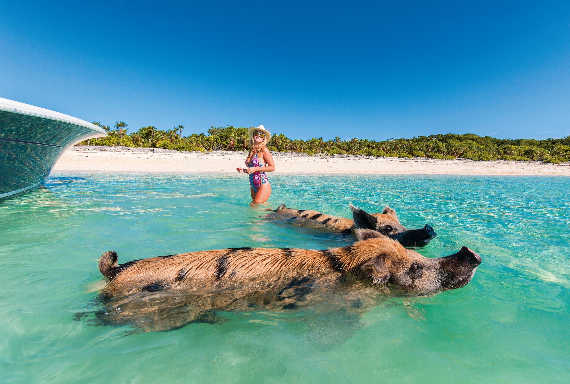 Experience the serenity of the beach in the Exumas, Bahamas, with Fraser Yachts. | Caribbean, Bahamas, Exumas, beach, woman, yacht charter | Fraser