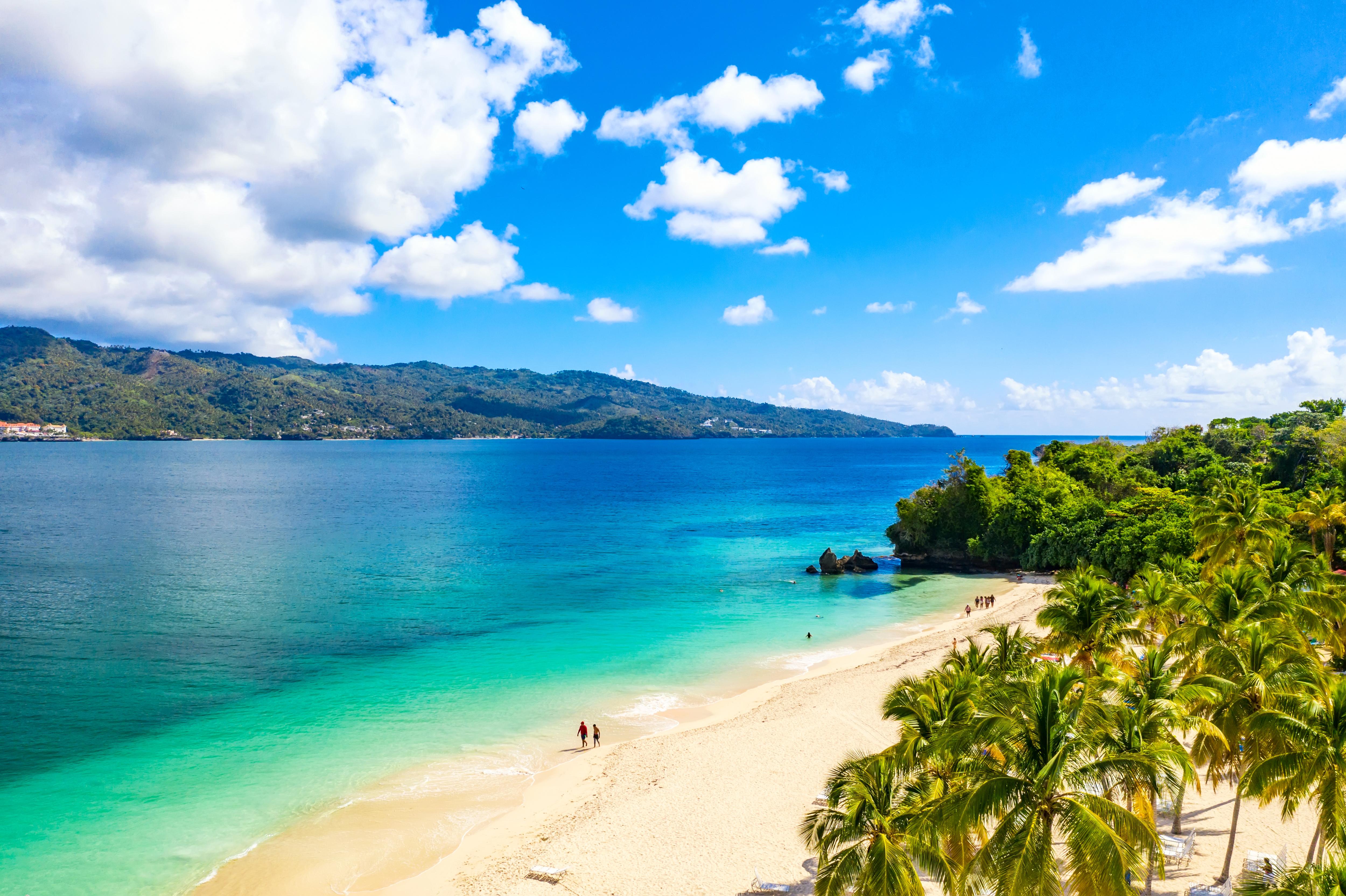 Stroll along the tropical paradise of Bacardi Island in the Dominican Republic, with its pristine beach and blue waters seen from an aerial view | Aerial view, beach walk, holiday, exotic, paradise, tropical, blue, trees, vacation | FRASER