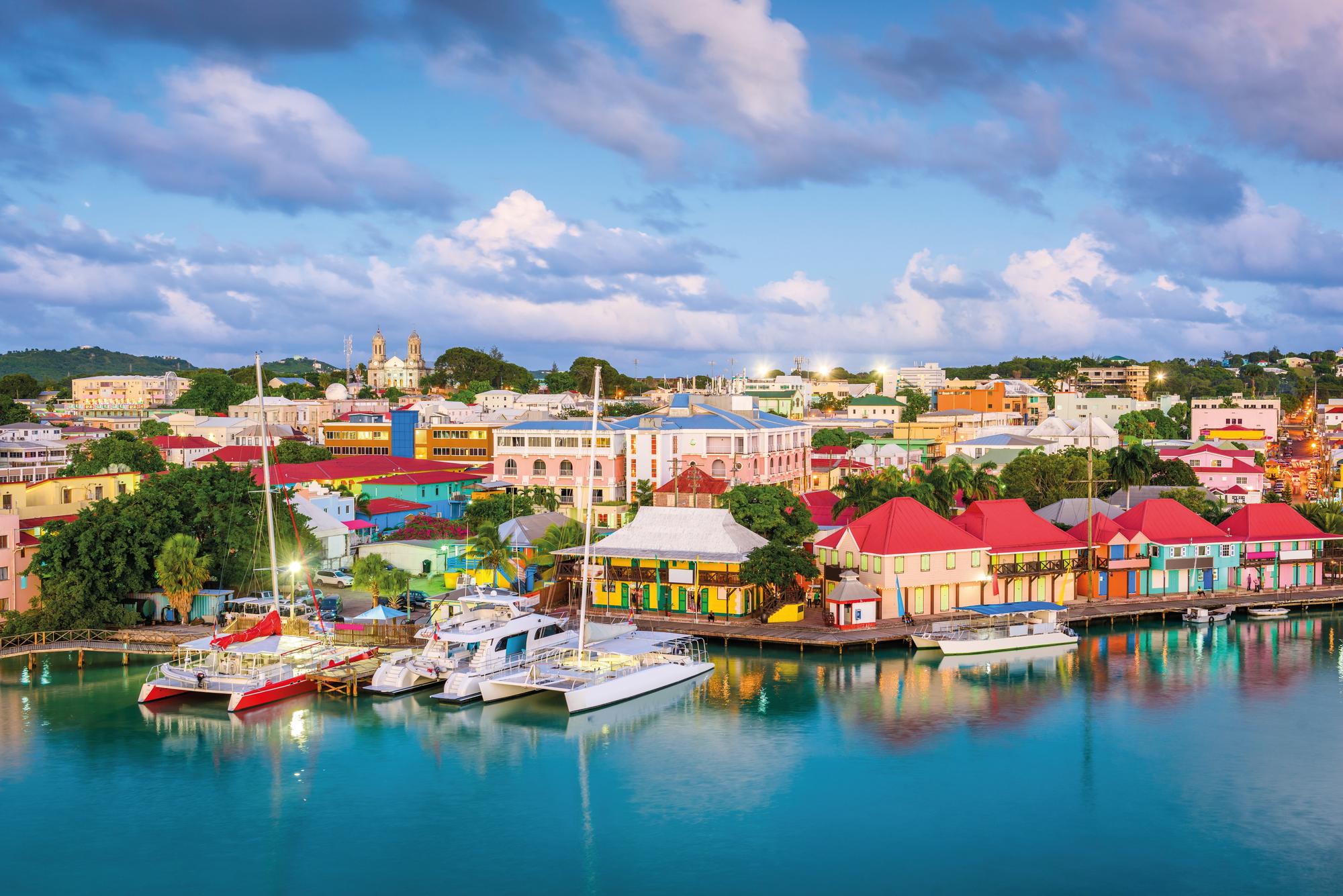 Experience the serene evening atmosphere at the dock in Antigua's Leeward Islands with Fraser Yachts. | Caribbean, Leeward Islands, Antigua, dock, evening, yacht charter | Fraser