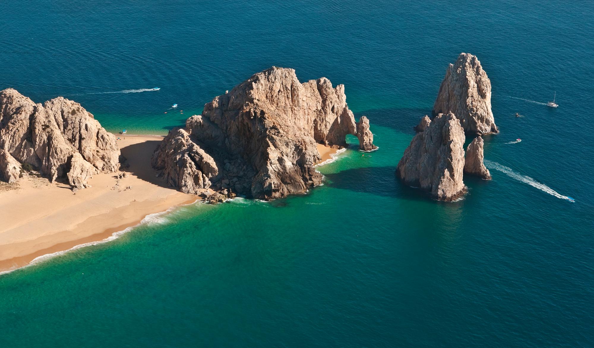 Explore the iconic El Arco rock formation in the Sea of Cortez, Mexico, Central America, with Fraser Yachts. | Central America, Mexico, Sea of Cortez, El Arco, yacht charter | Fraser