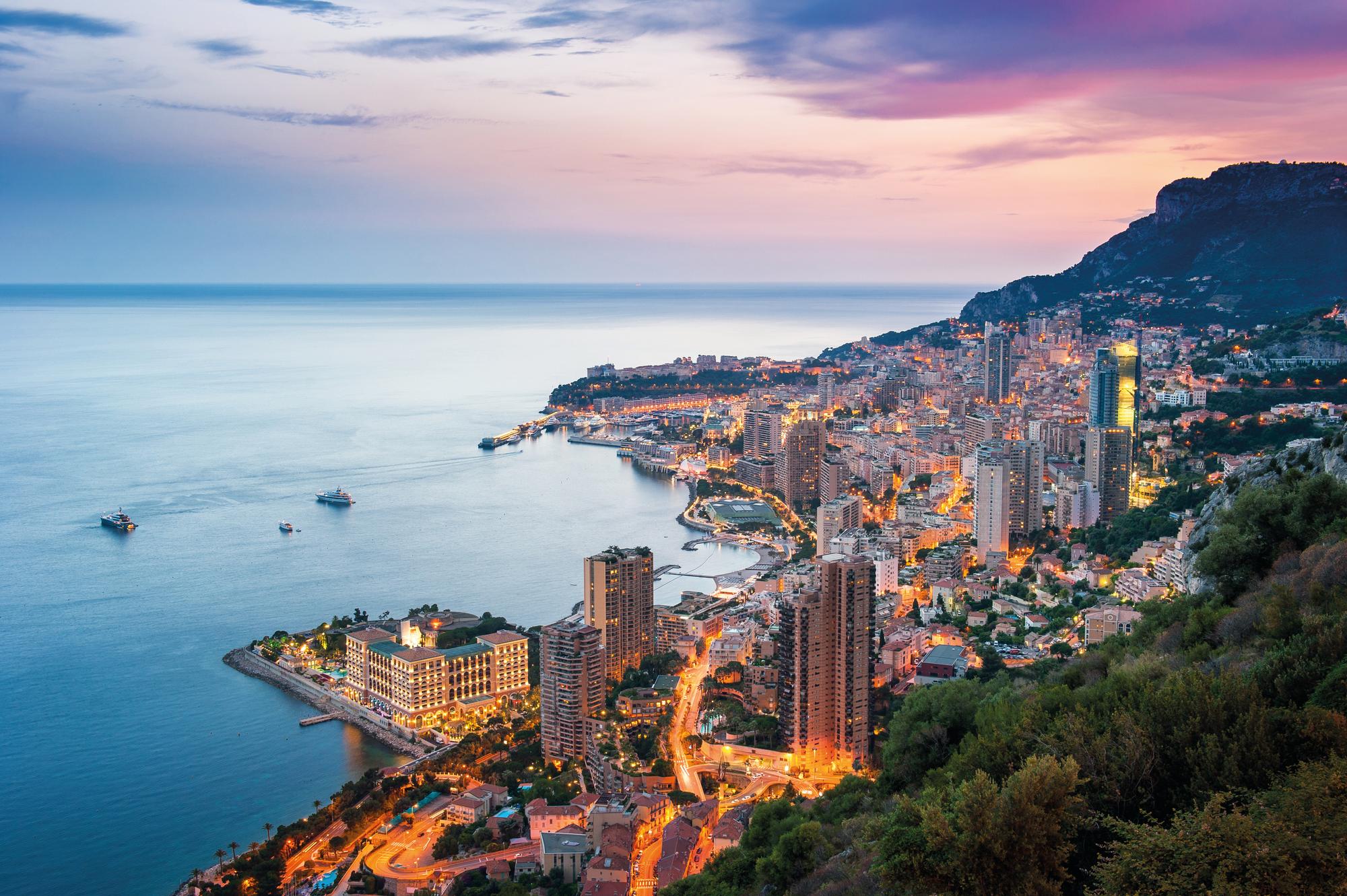 Witness mesmerizing sunsets from an aerial view in Monaco, your premier Mediterranean destination with Fraser Yachts. | Mediterranean, Monaco, sunset, aerial view, yacht charter | Fraser