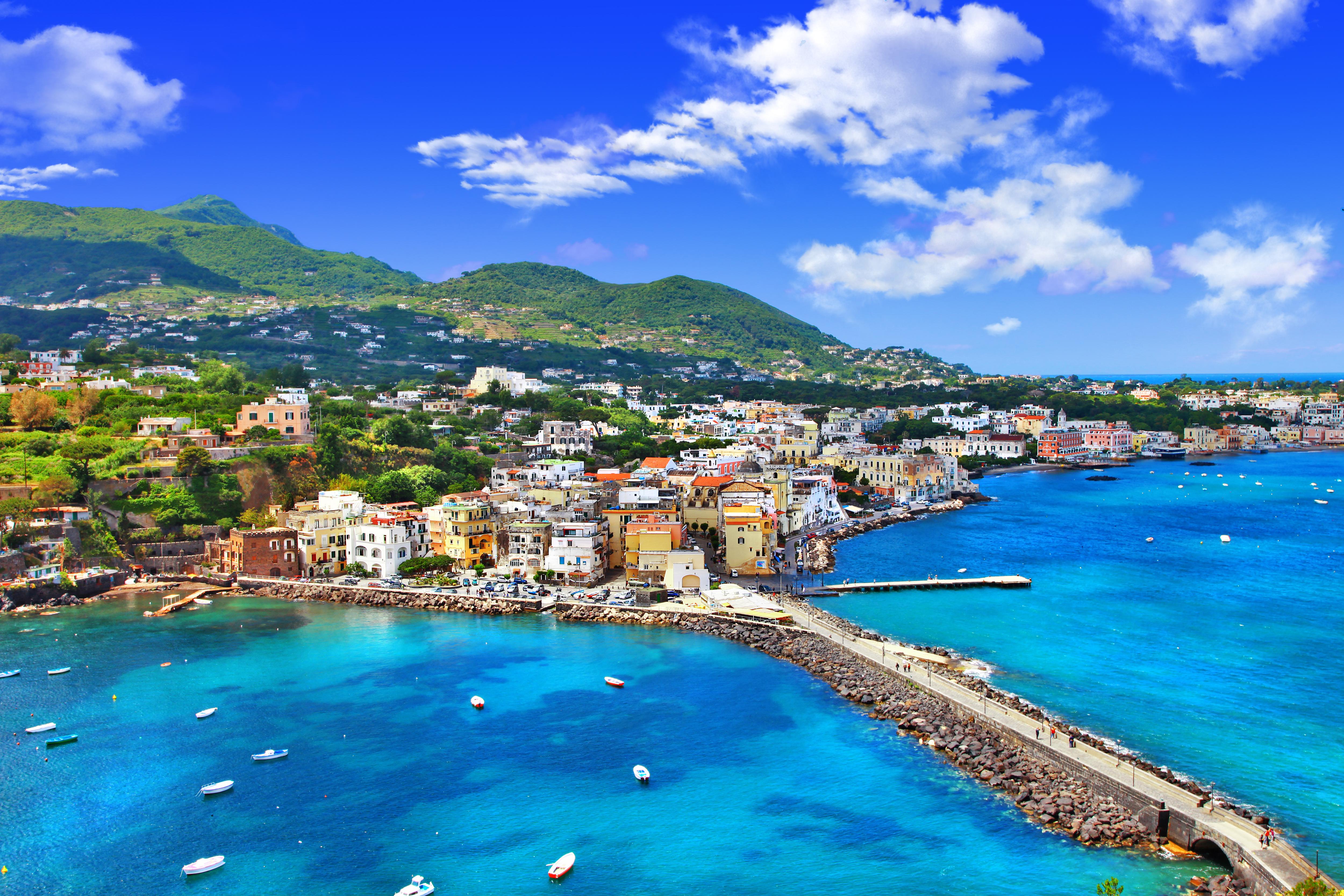 Ischia coastline, Italy—turquoise bays and coastal towns create a scenic Mediterranean destination perfect for yacht cruising and seaside exploration | Fraser Yachts