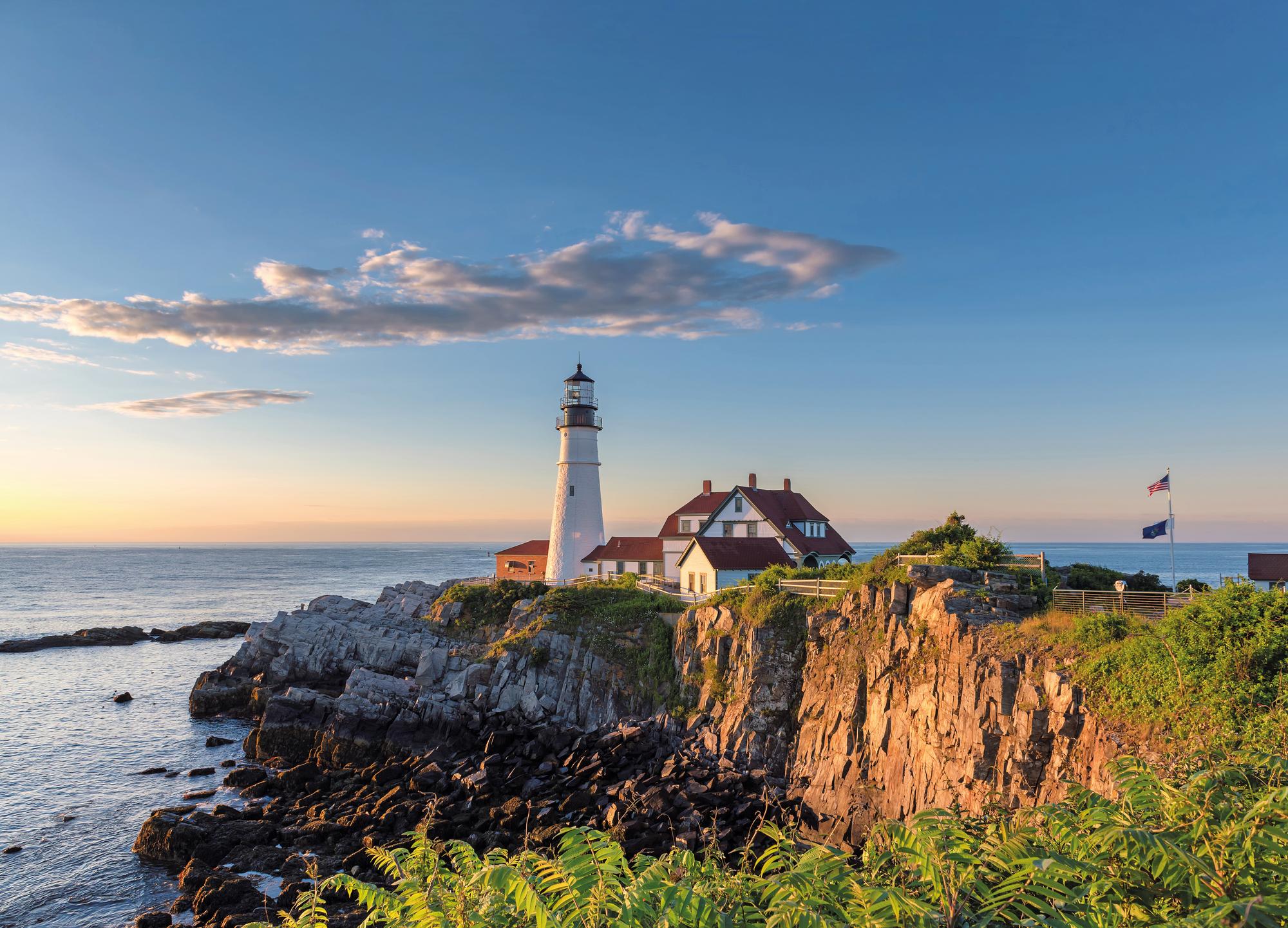 Portland: Witness the breathtaking sunrise over the charming shores of New England. | Portland, New England, North America, sunrise | FRASER