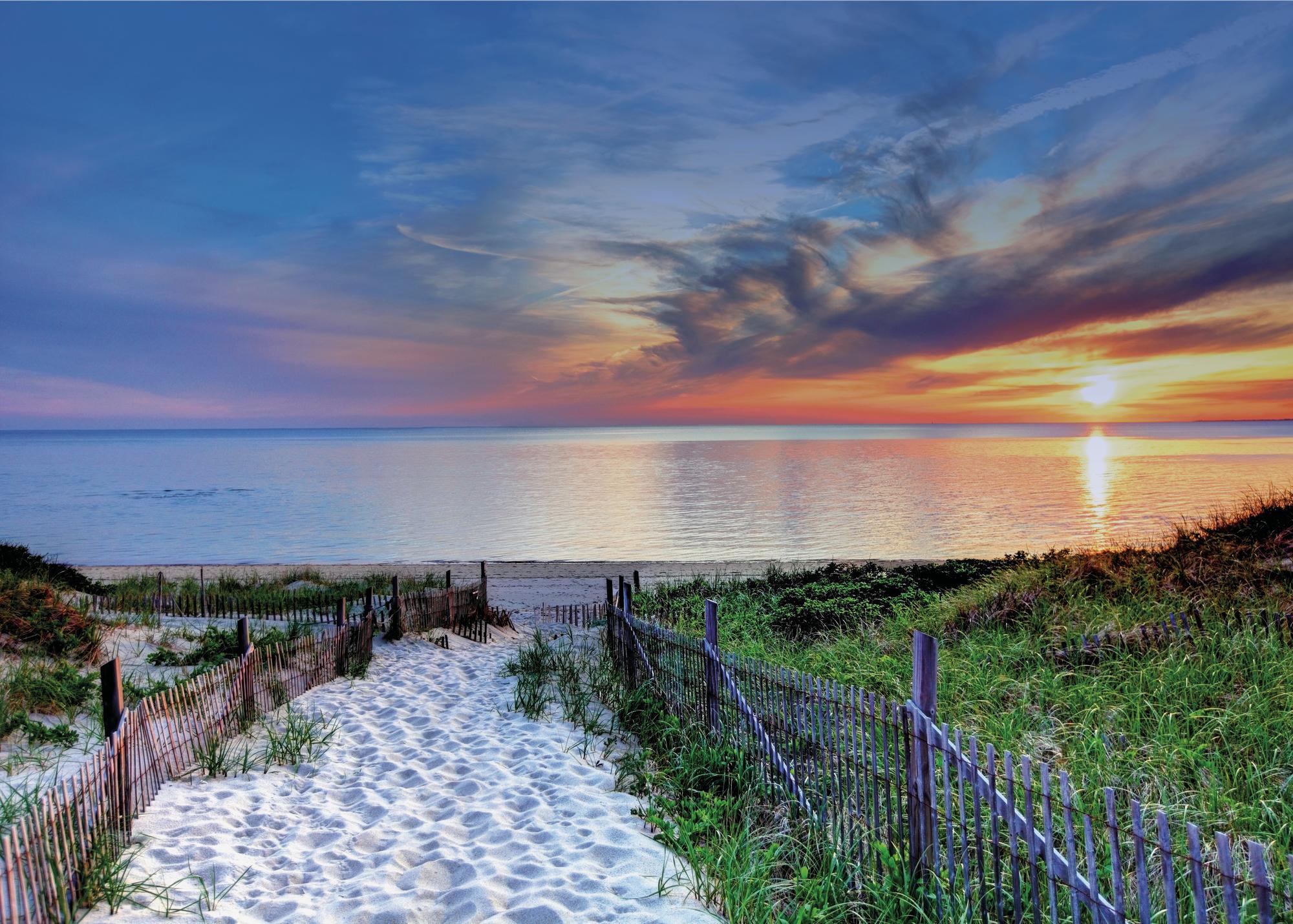 Atlantic Sunset Serenity: Golden hues embrace white sands along the North American coast, a tranquil scene where beach meets ocean. | North America, sunset, beach, white sand, Atlantic Ocean | FRASER