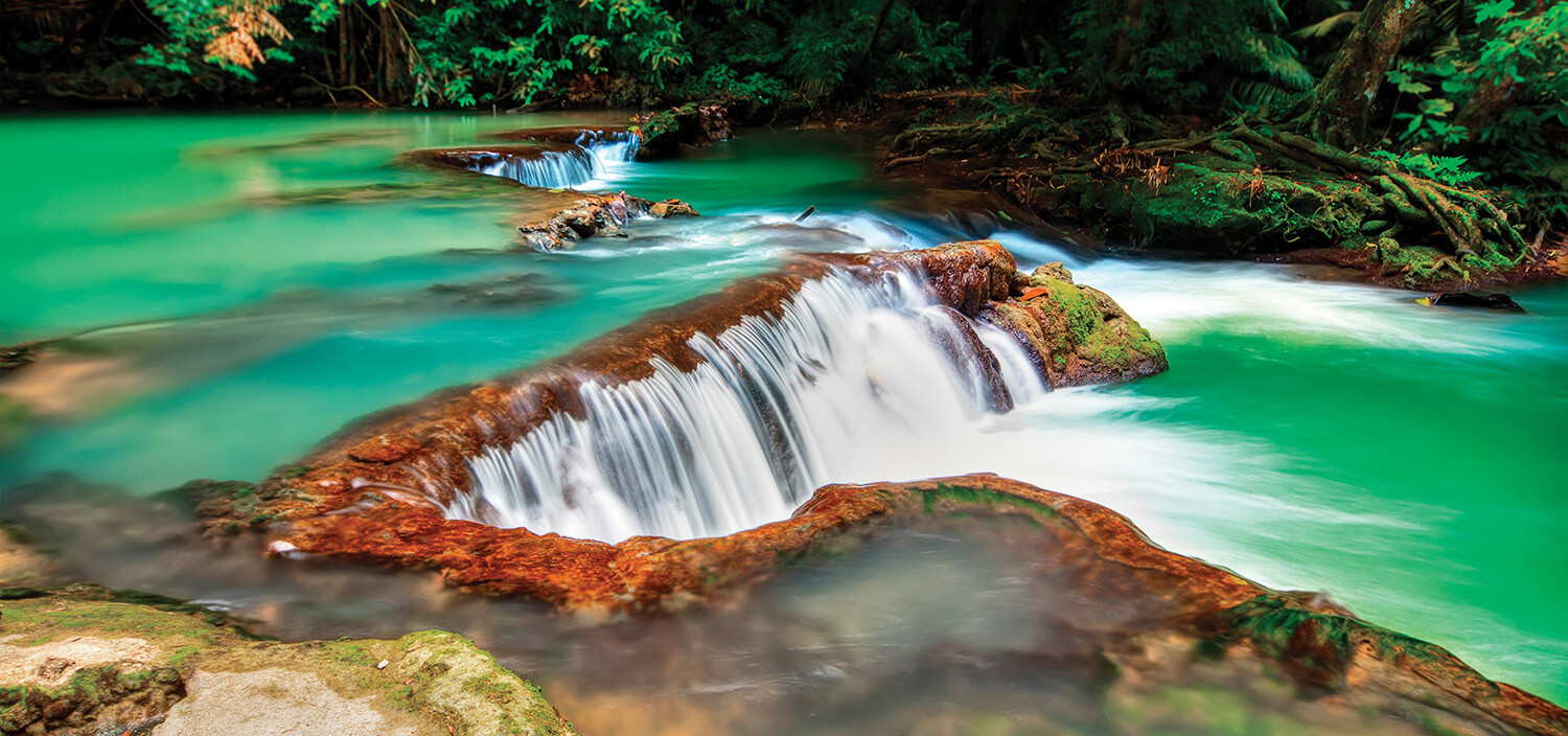 Discover the stunning beauty of Bali's Amoramor Bay and Lombok's breathtaking waterfalls with a luxury yacht charter, offering a perfect blend of serene waters and natural wonders | Bali yacht charter, Amoramor Bay, Lombok waterfalls, luxury yacht destination, Fraser Yachts | Fraser Yachts