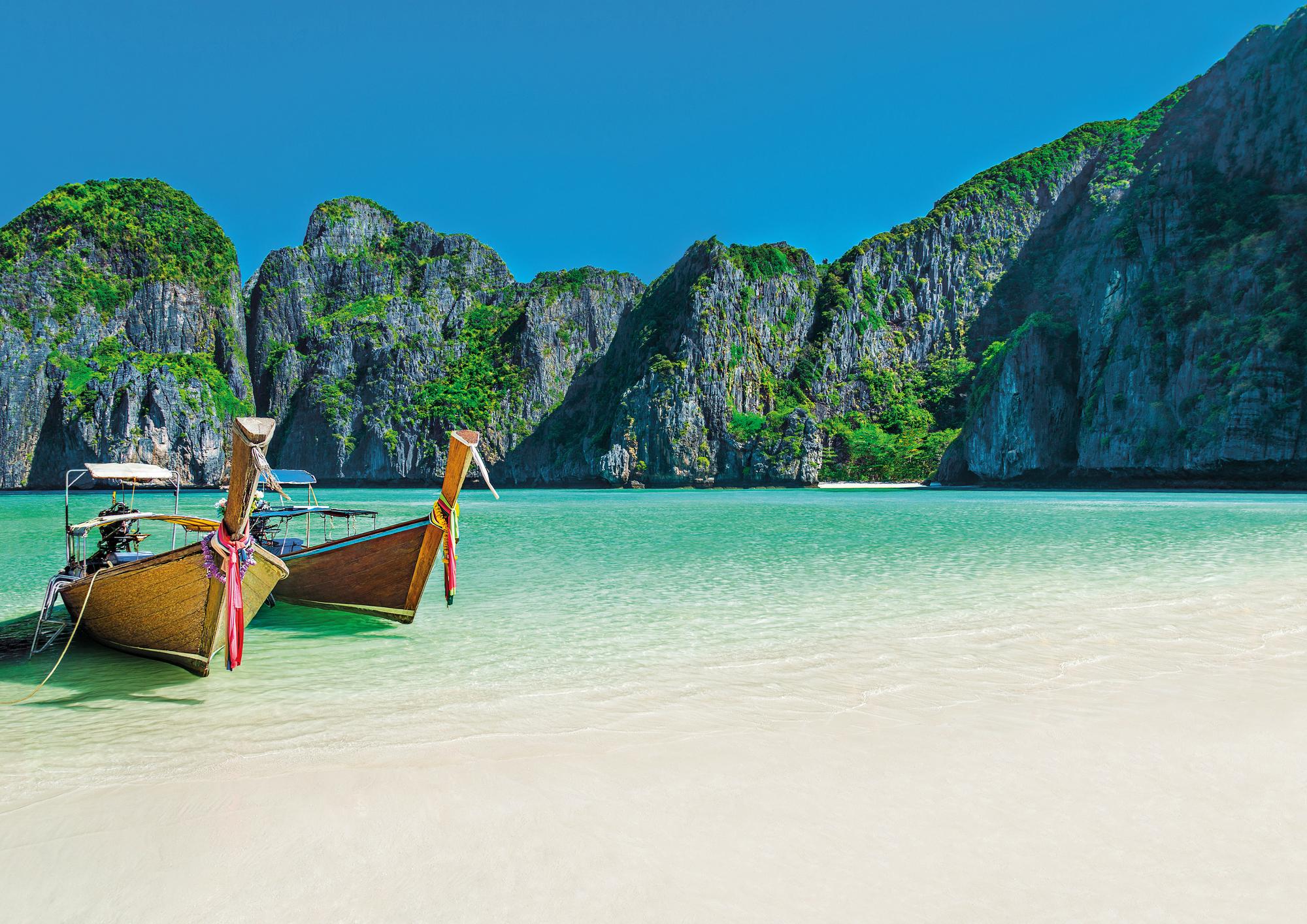 Experience the charm of traditional boats in Thailand, Southeast Asia, with Fraser Yachts. | Southeast Asia, Thailand, boats, yacht charter | Fraser