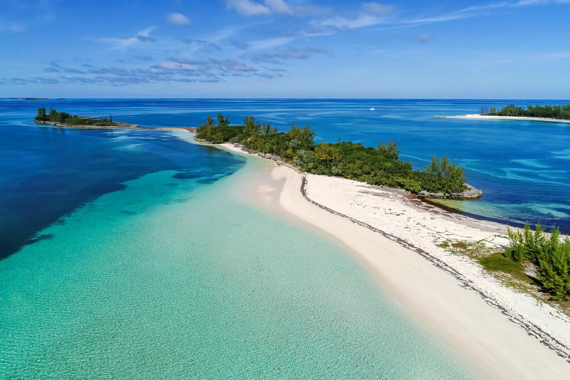 Take in the stunning aerial view of Munjack Cay Beach in the Abacos, Bahamas | Munjack Cay, Abacos, beach, aerial view | FRASER