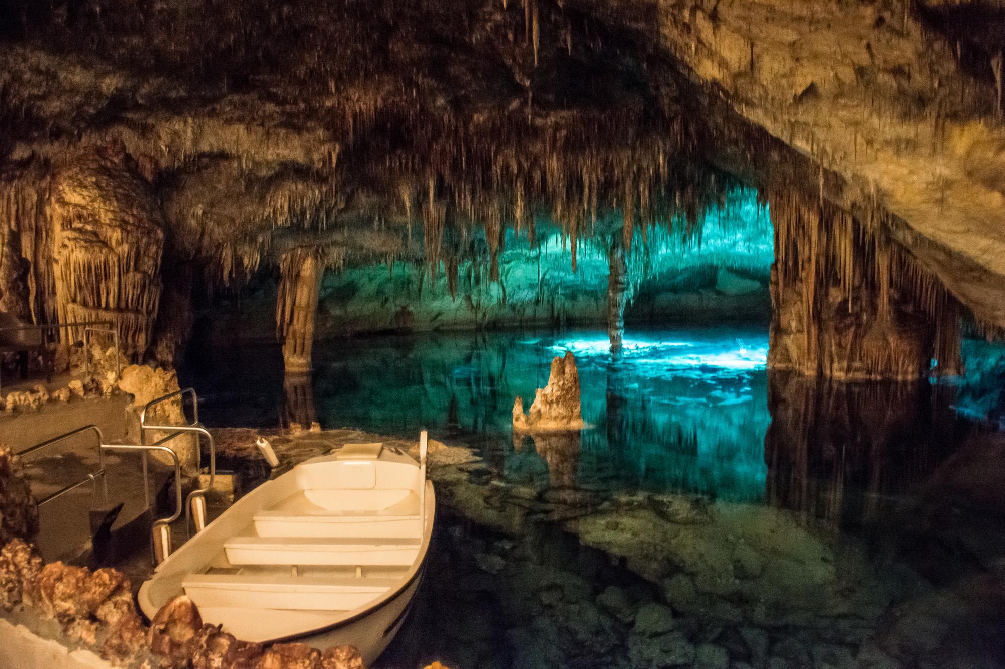 Discover the geological marvels of Cuevas del Drach in Spain's Balearic Islands, famous for its cave formations, stalagmites, cliffs, and tourism appeal | Geology, cave, formation, stalagmite, cliff, tourism | Fraser