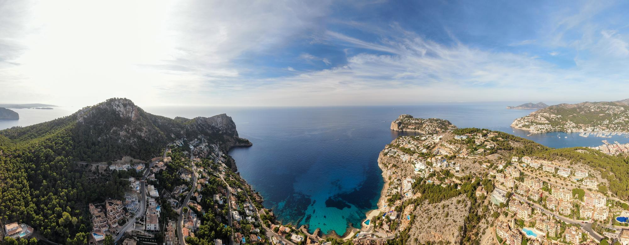 Enjoy the panoramic view of Puerto Andratx in Spain's Balearic Islands, known for its stunning natural beauty, coastline, and turquoise waters | Panoramic view, nature, coast, shoreline, turquoise water, Puerto Andratx, Balearic Islands, Spain | Fraser