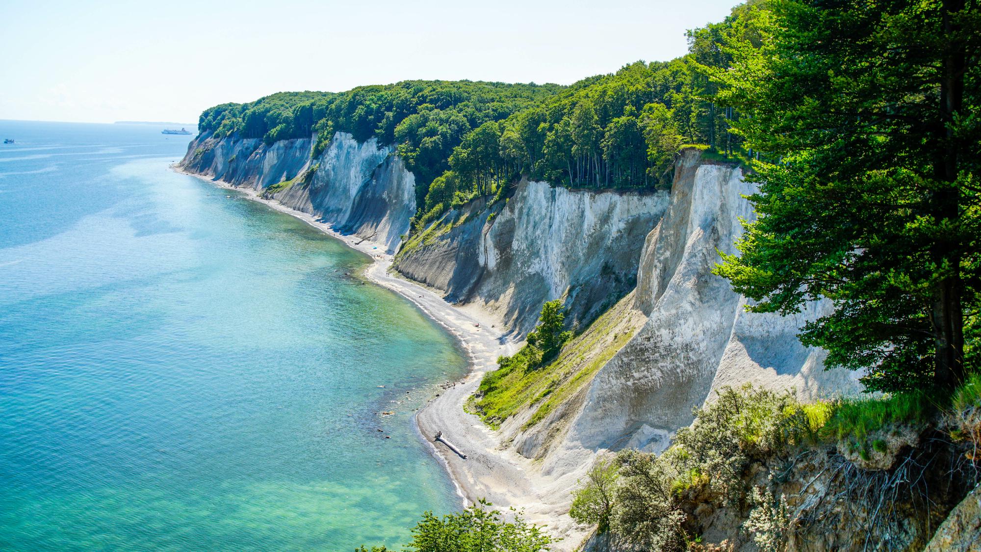 Experience the majestic cliffs of Rügen on the Baltic Sea in Germany, offering a picturesque and tranquil travel escape | Rügen, Cascade, Beauty, Cliff, Travel, Baltic, Germany | Fraser