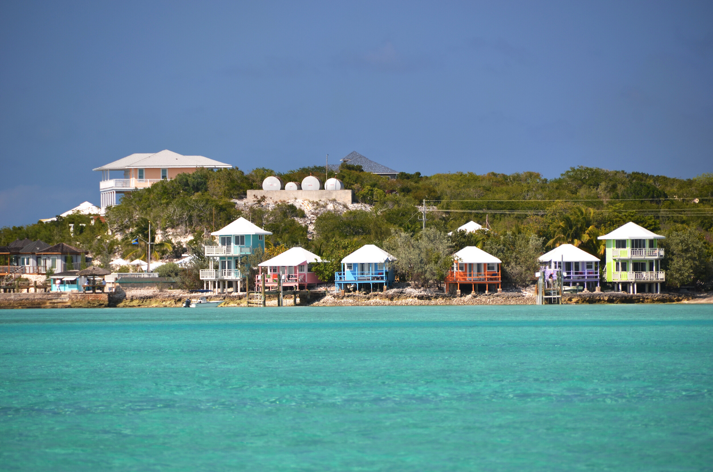 Staniel Cay Yacht Club in the Exumas, Bahamas—vibrant marina and island hub for luxury yacht charters, with access to swimming pigs, Thunderball Grotto, and nearby sandbars | Fraser Yachts