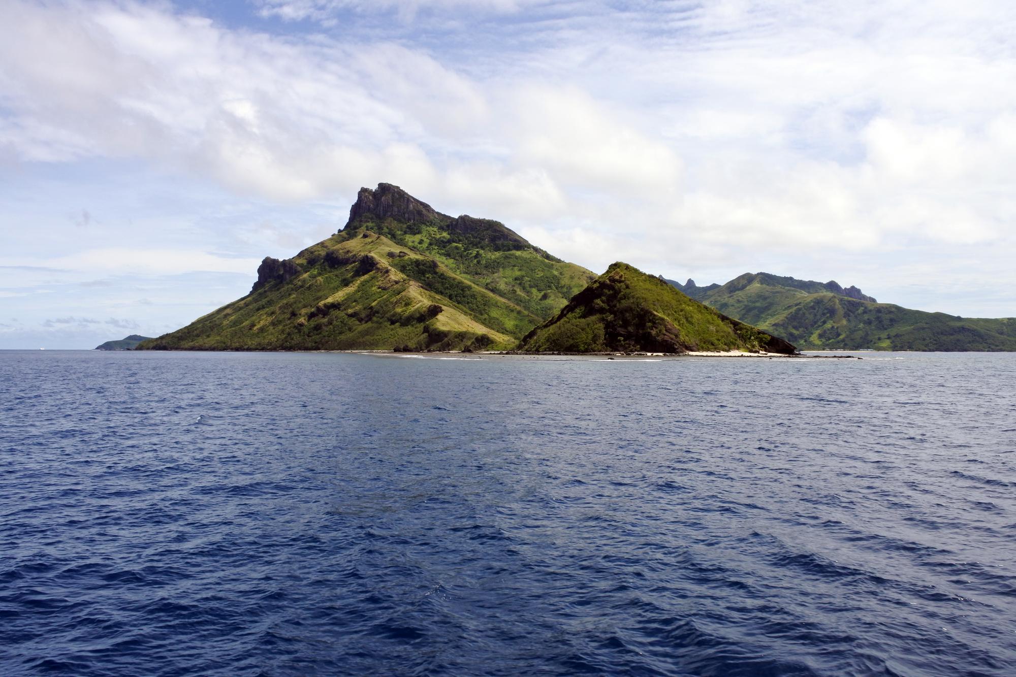 Experience the peaceful Yasawa Islands in Fiji, featuring lush green scenery and a perfect destination for tranquil tourism | Island, Green, Island Country, Tranquil, Tourism, Leisure, Aerial | Fraser