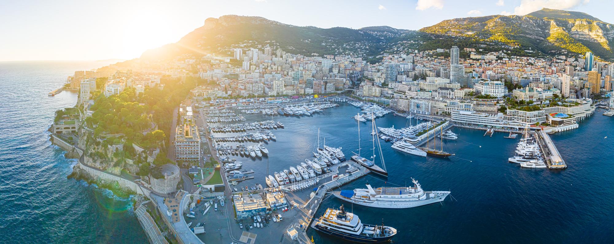 Experience the opulence of Monaco with a captivating aerial view, a highlight on the Mediterranean itinerary. | Monaco aerial view, Mediterranean France itinerary, French Riviera, Fraser Yachts | fraser