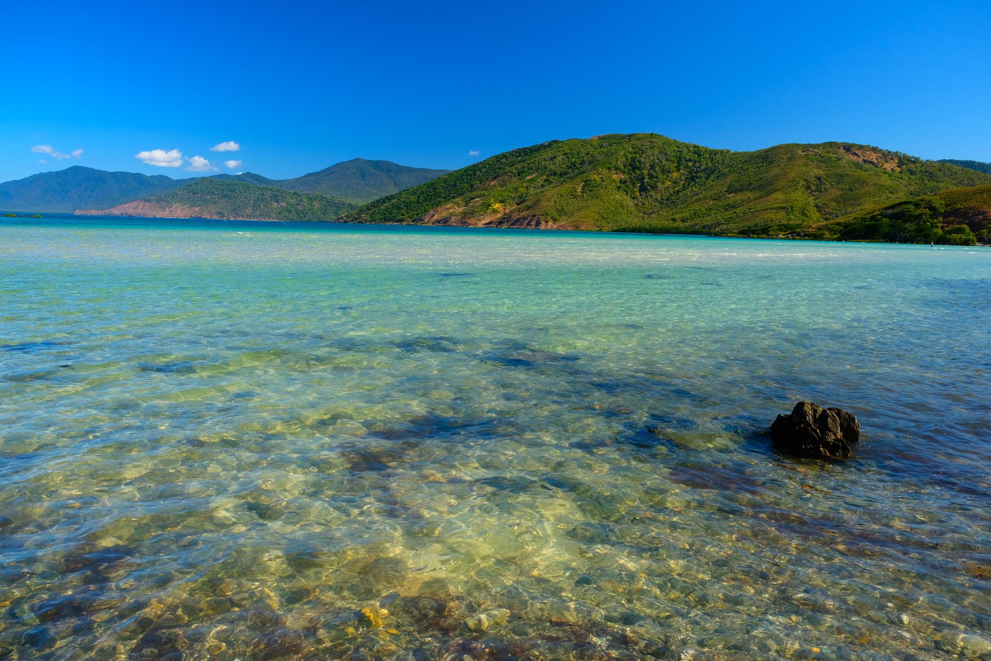 Explore the scenic beauty of Port Cooktown’s coast and beach, a perfect summer destination for experiencing the Great Barrier Reef | Scenic, travel, summer, coast, beach | Fraser