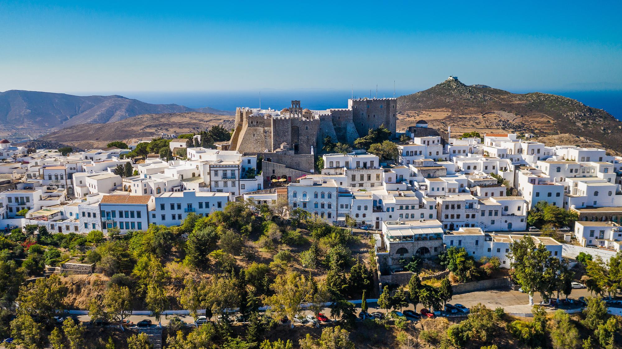 Explore the Monastery of Saint John the Theologian in Patmos, Greece, a serene destination in the Mediterranean itinerary. | Patmos Monastery, Mediterranean Greece itinerary, Saint John the Theologian, Fraser Yachts | fraser