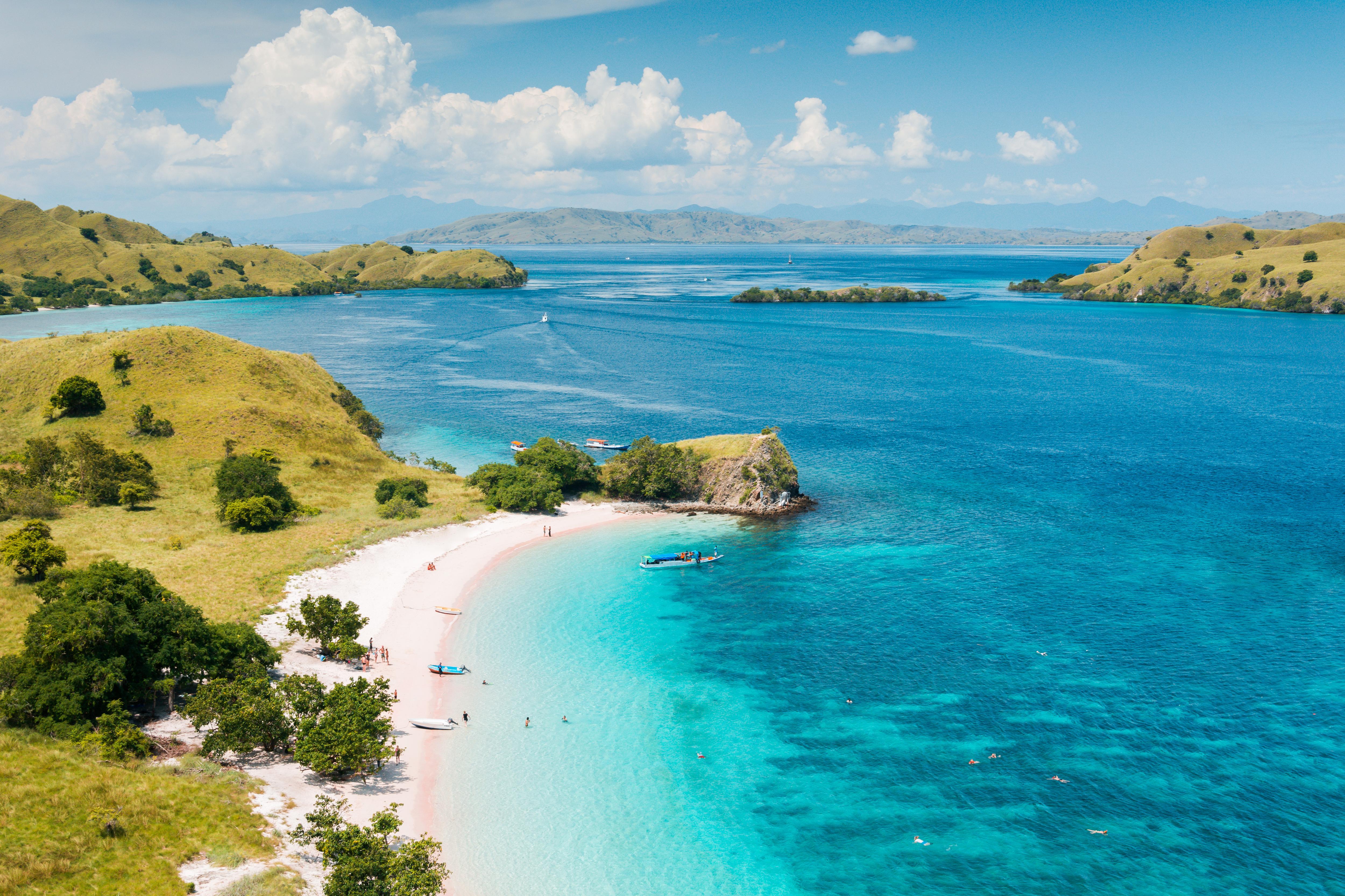 Scenic view of Padar Island in Komodo National Park, Indonesia—dramatic peaks, calm anchorages, vibrant coral reefs, and mangrove-lined bays ideal for watersports and tender cruises | Fraser