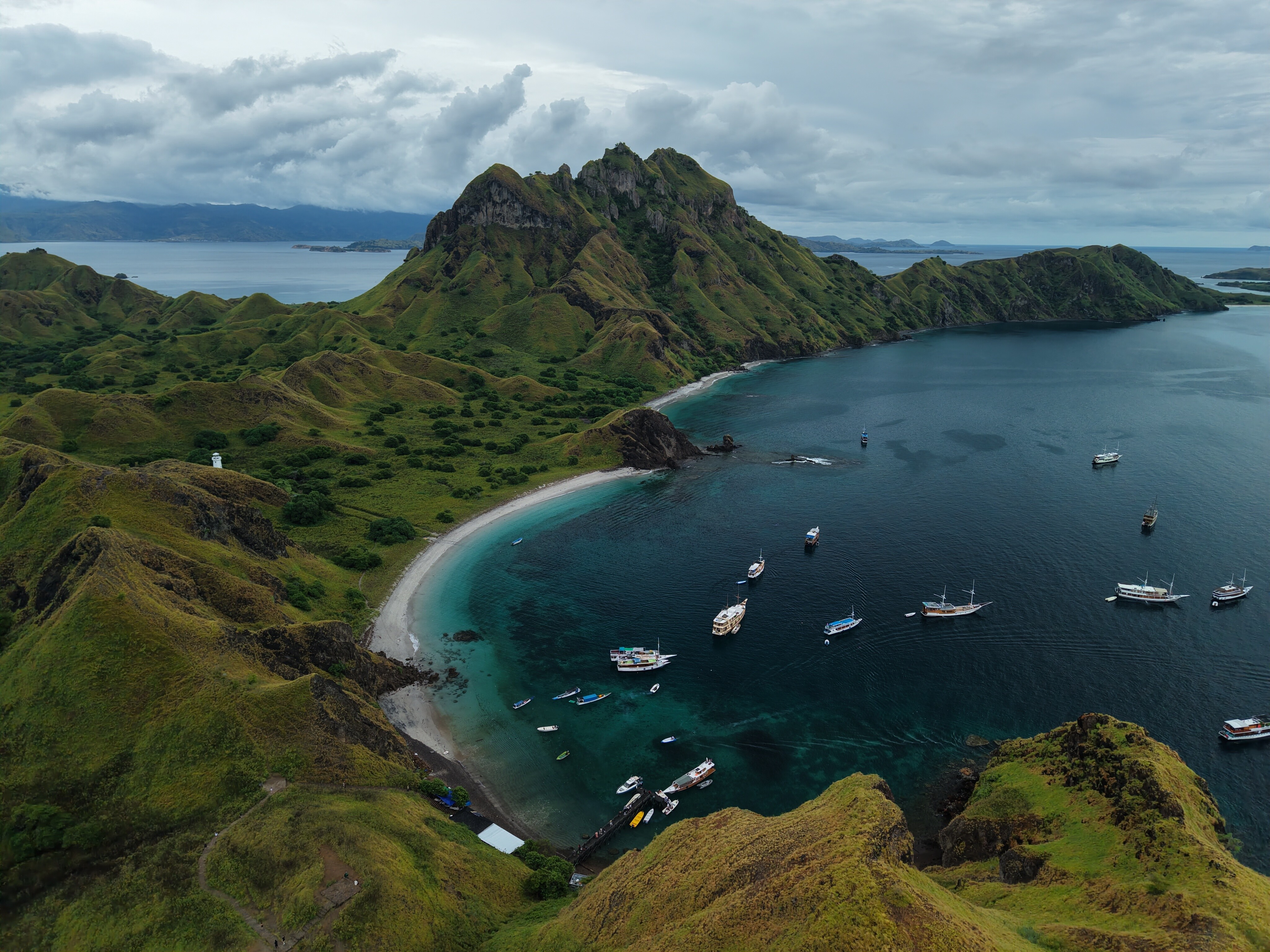 Aerial view of Padar Island near Labuan Bajo, Indonesia—part of the Komodo Islands, known for iconic ridge hikes, pink-sand beaches, and epic yacht charter panoramas | Fraser