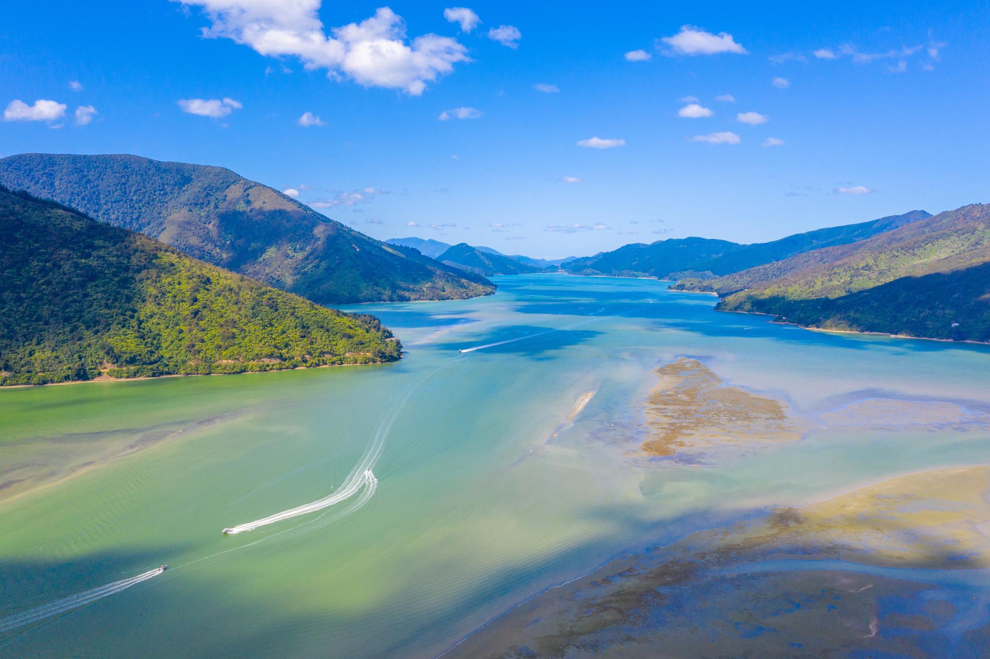 Explore Pelorus Sound from above: Aerial view of the river with clouds and tidal movement | Aerial, Cloud, Pelorus Sound, River, Tide | Fraser