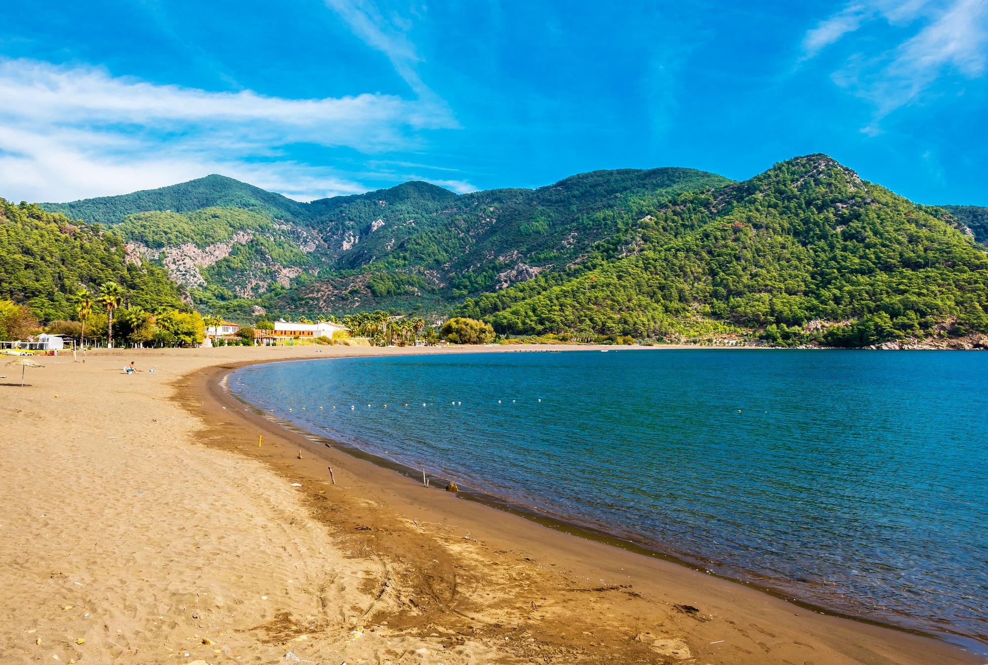 Enjoy the serene beauty of Eknick Bay on the Aegean coast of Turkey, a perfect spot for a relaxing beach vacation surrounded by nature | Aegean, beach, nature, vacation, Eknick Bay, Turkey | Fraser