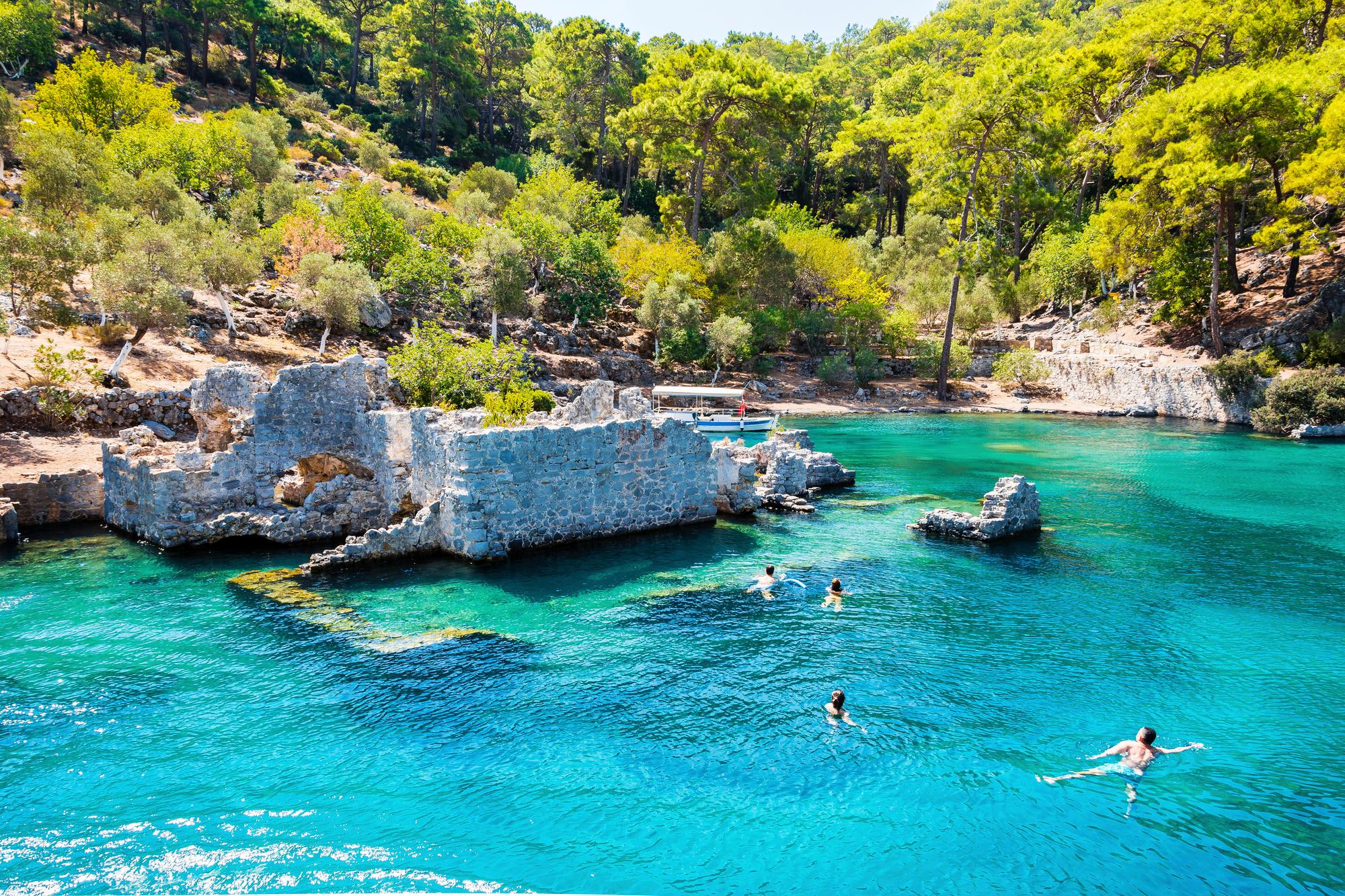 Explore the stunning natural beauty of Göcek in Turkey, known for its pine forests, serene nature, and wonderful swimming spots | Göcek, forest, nature, pine, swimming, vacation, wonderful | Fraser