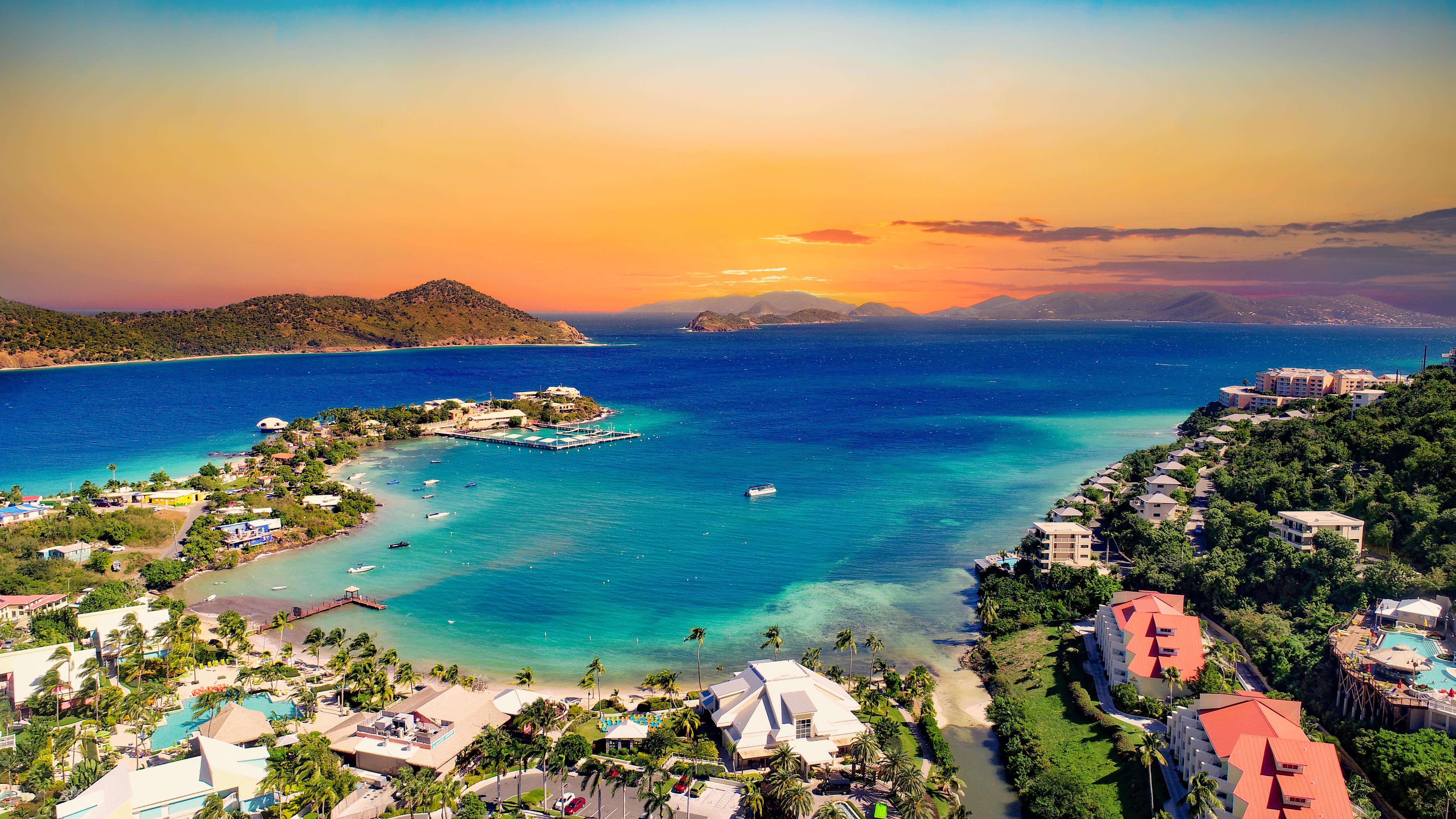 Aerial view of St. Thomas, US Virgin Islands—tropical skyline, cruise ships, coves, and Caribbean beaches near Charlotte Amalie, perfect for luxury charters and sunset views | Fraser Yachts