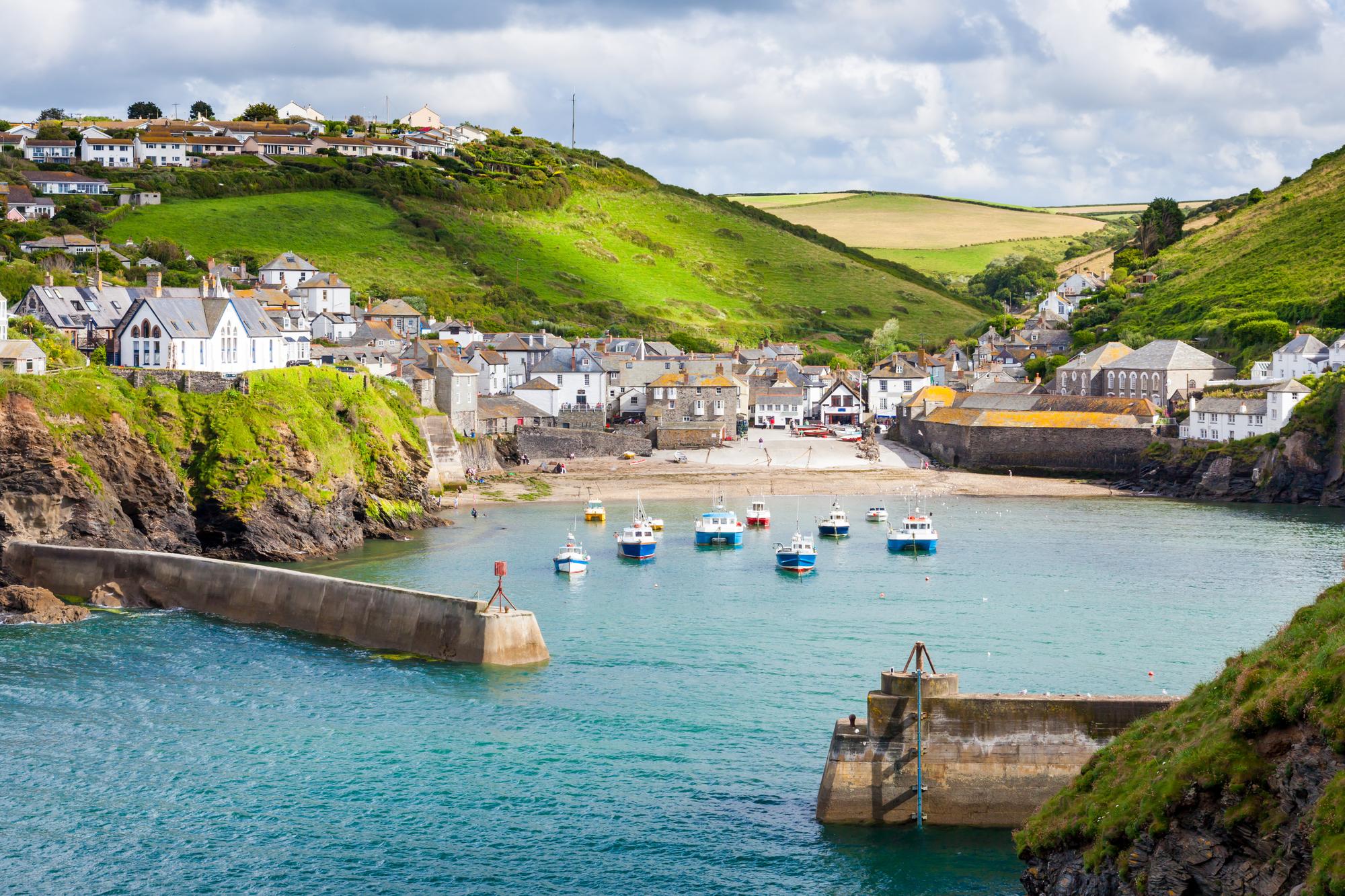 Discover Port Isaac on Cornwall's Atlantic Coast, offering a picturesque fishing village experience and a great travel destination | Atlantic Coast, Fishing Village, Port Isaac, Travel Destination | Fraser