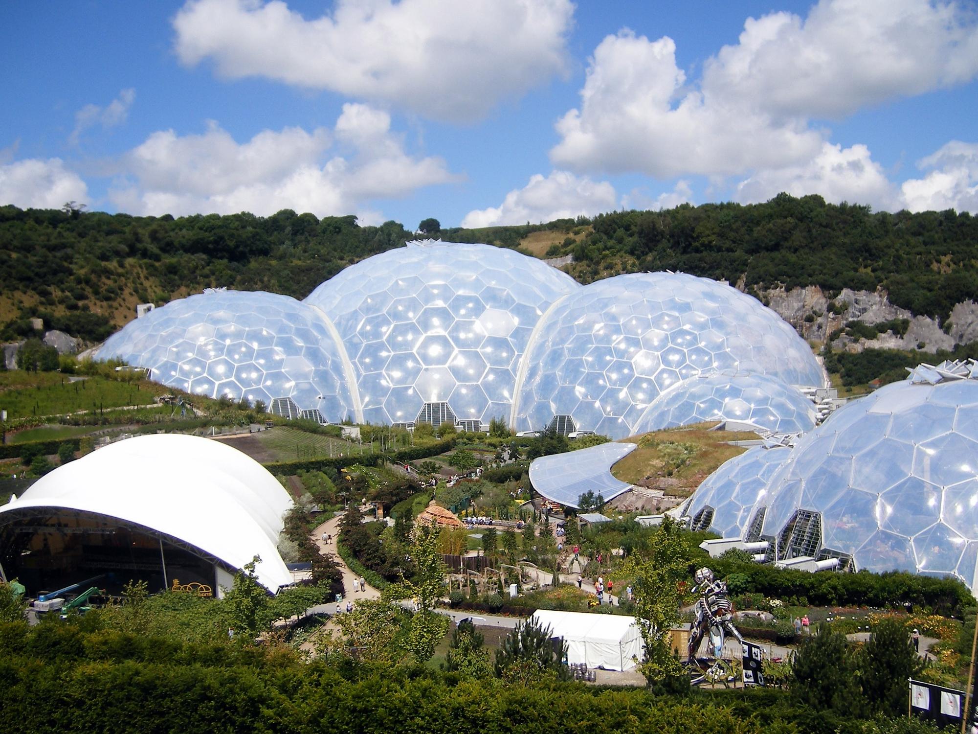 Discover the Eden Project in the UK with its unique biome conservatories, offering a controlled environment and innovative structures for visitors | Biome Conservatories, Controlled Environment, Structures | Fraser