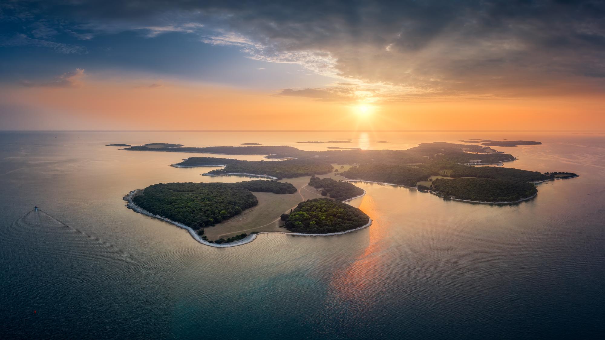 Experience the majestic beauty of Brijuni National Park in Croatia, with its stunning sunrise dawn and breathtaking skies | Sunrise dawn, majestic, sky, beauty, Brijuni National Park, Croatia | Fraser
