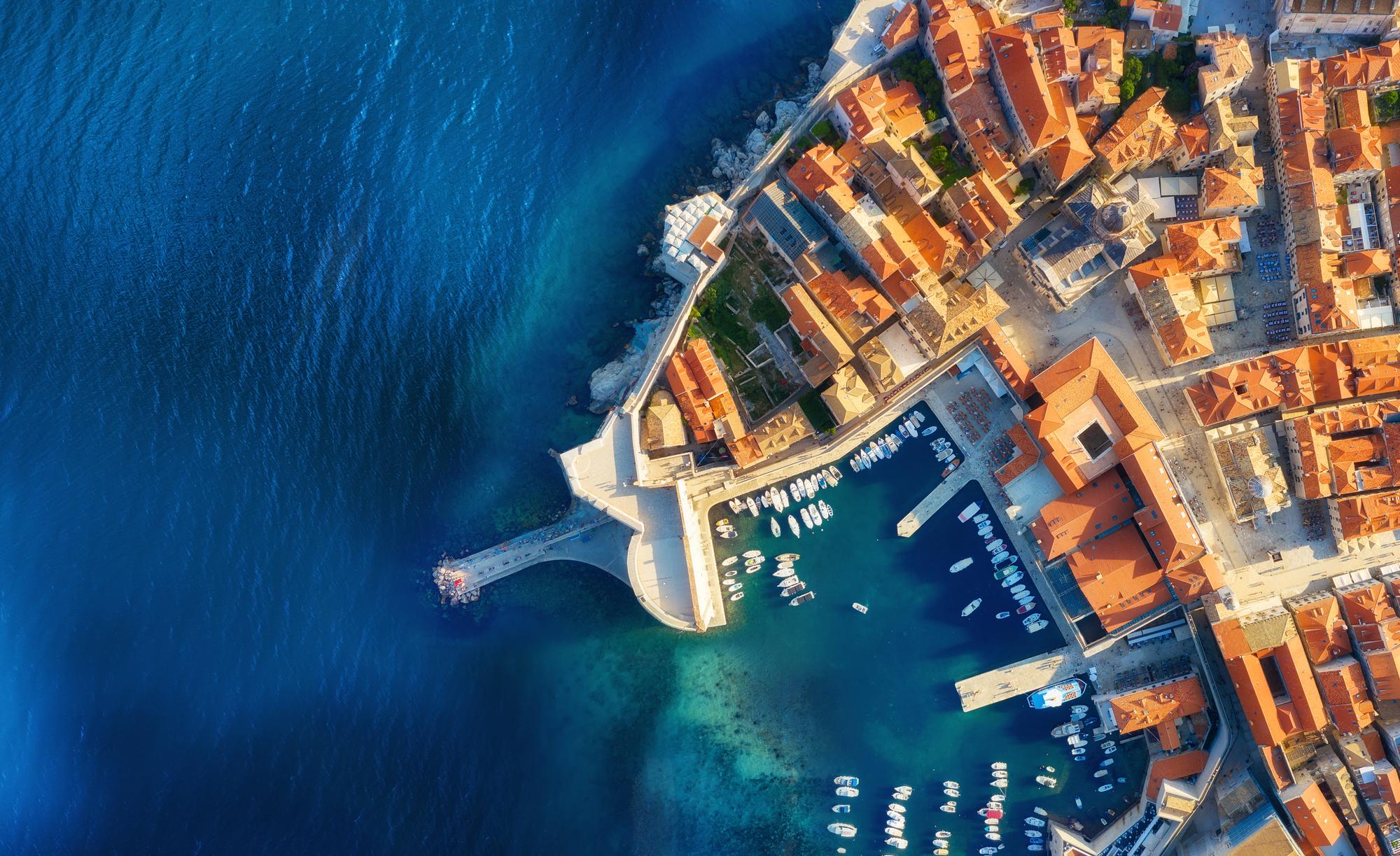 Capture the beauty of Dubrovnik from the air, showcasing its allure as a top tourism destination in Dalmatia, Croatia | Aerial, Dalmatia, destination, tourism, Dubrovnik, Croatia | Fraser