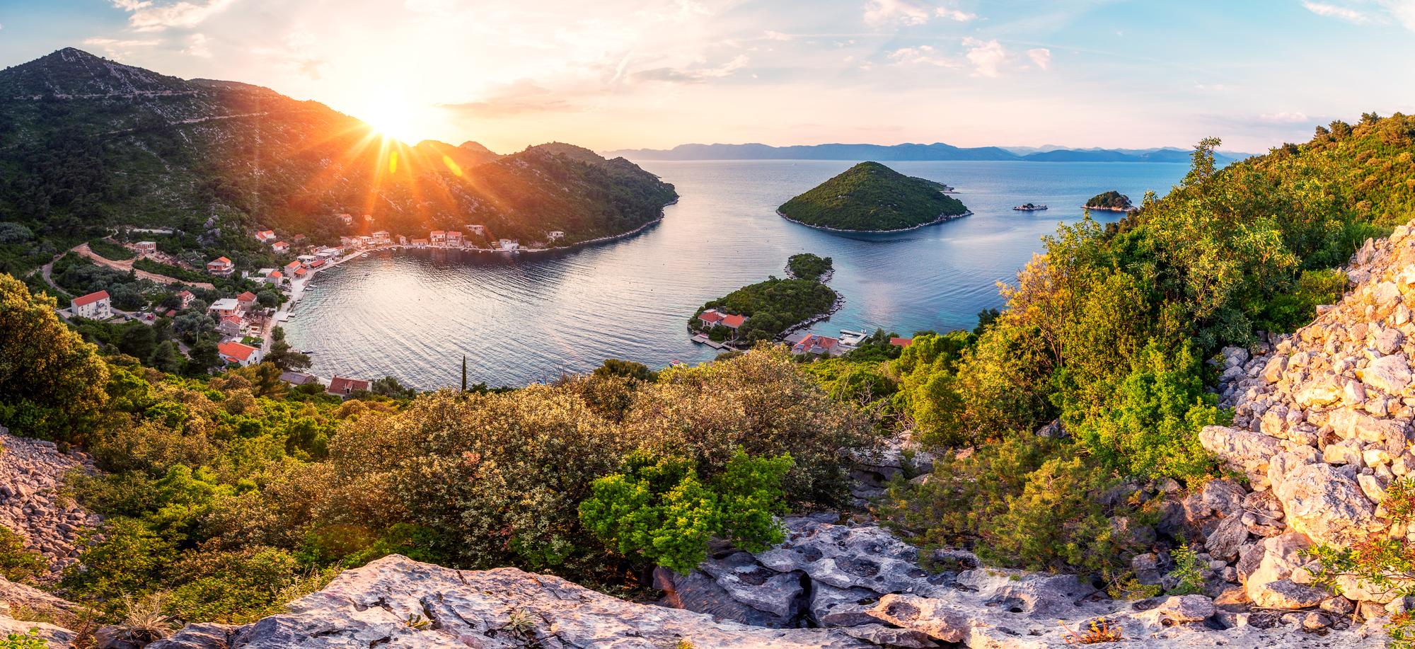 Enjoy the serene beauty of the Island of Mljet in Croatia, featuring stunning beaches, picturesque sunsets, and breathtaking mountainous landscapes | Beach, sunset, nature, mountain, Island of Mljet, Croatia | Fraser