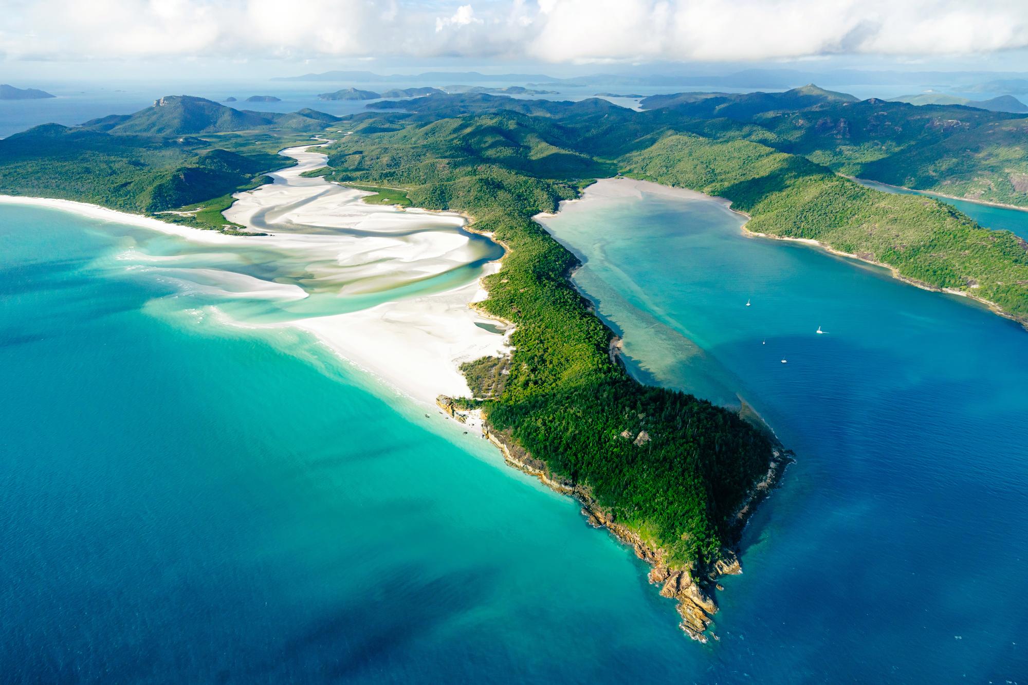 Whitsundays: Aerial view of Hill Inlet, showcasing a scenic paradise in Queensland with stunning turquoise waters and white sand | Aerial, Hill Inlet, Paradise, Queensland, Scenic | Fraser